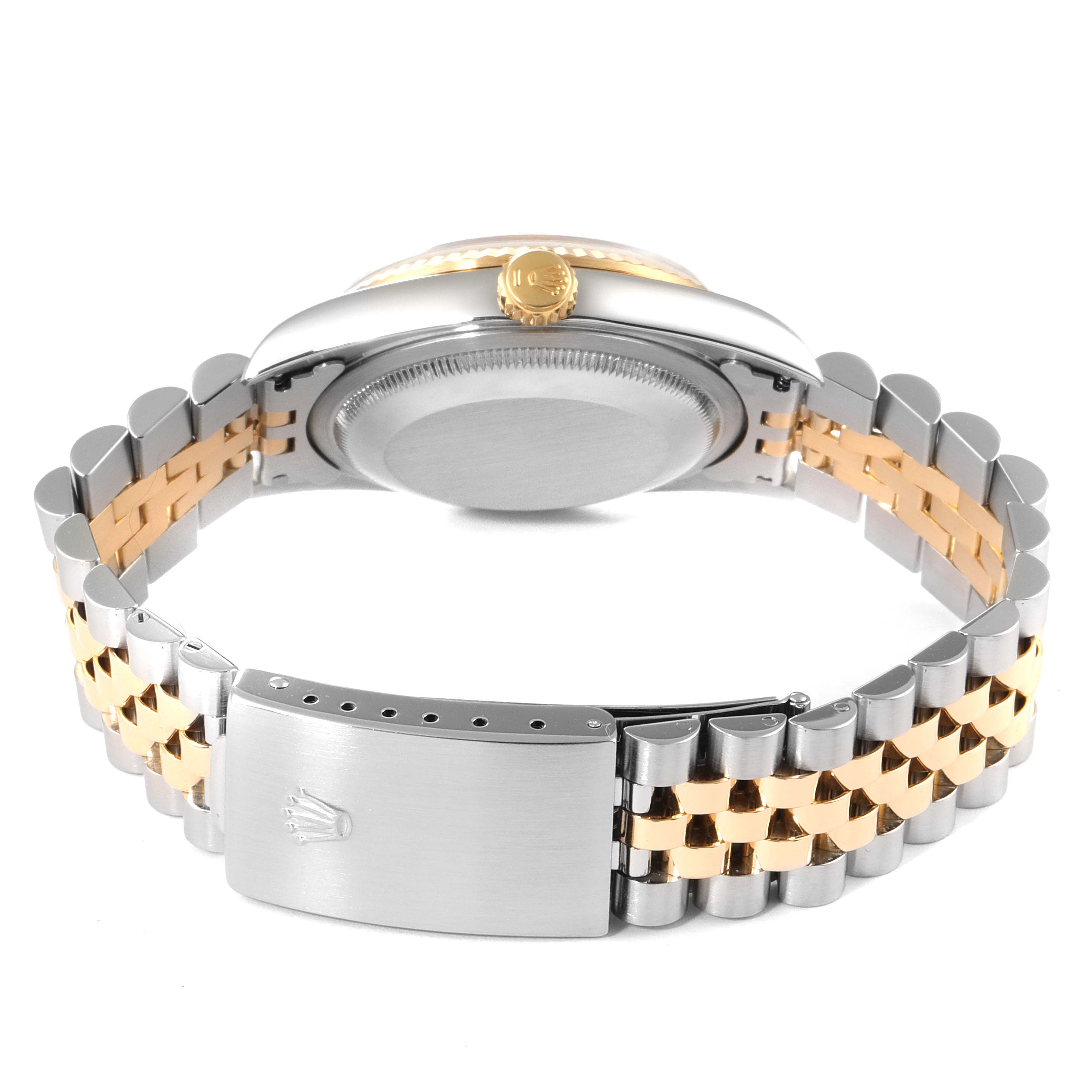 The image shows the back view of a Rolex Datejust 16233 Men's Steel and Gold (two tone) Blue Dial 16233 Men's Steel and Gold (two tone) Blue Dial watch, focusing on the caseback and two-tone bracelet.