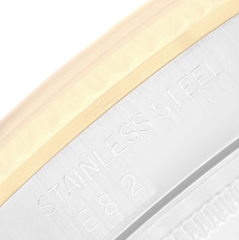 This image shows a close-up of the side engraving on a Rolex Datejust 16233 Men's Steel and Gold (two tone) Beige Dial 16233 Men's Steel and Gold (two tone) Beige Dial, highlighting the "STAINLESS STEEL" marking.