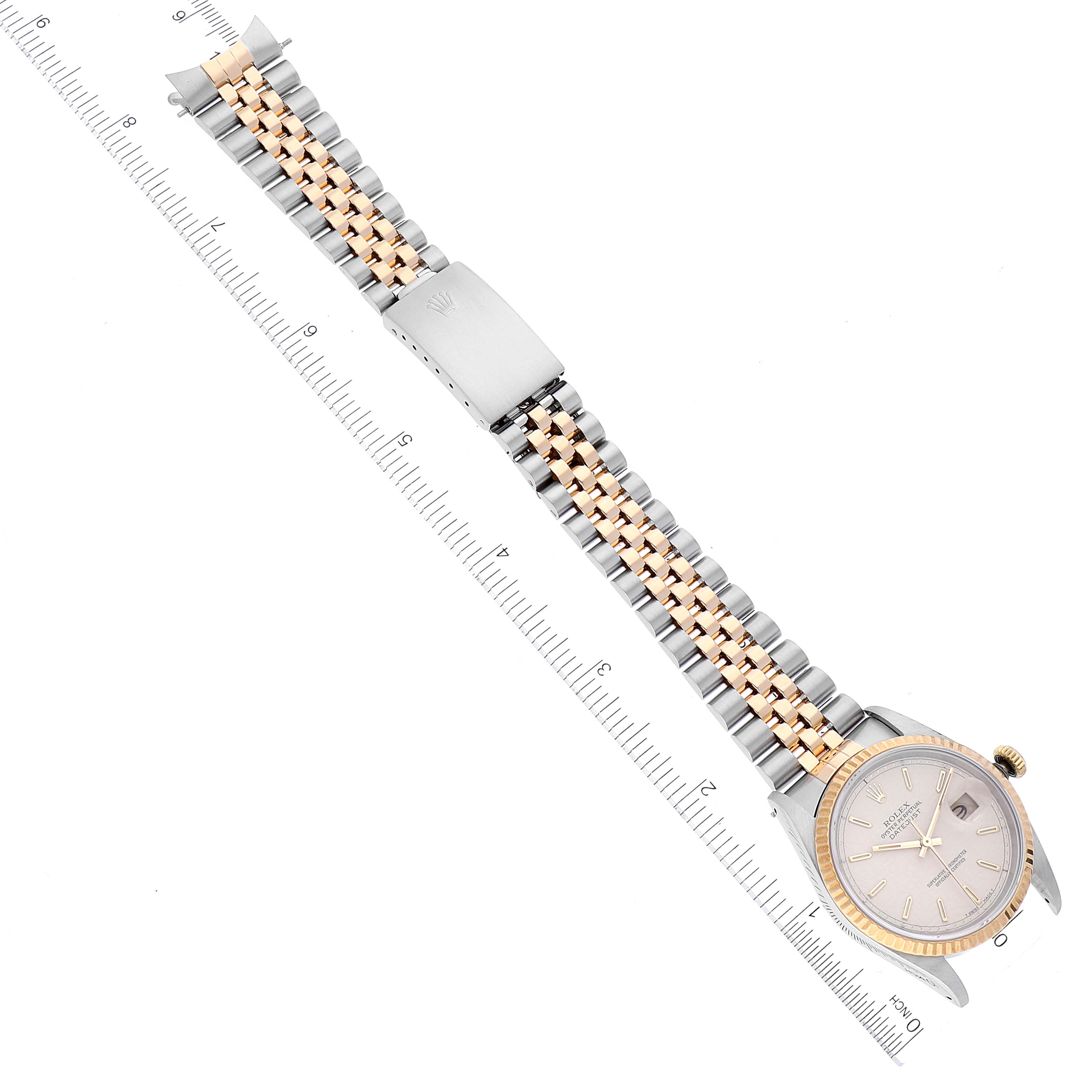 The image shows a top-down view of a Rolex Datejust 16233 Men's Steel and Gold (two tone) Beige Dial 16233 Men's Steel and Gold (two tone) Beige Dial watch, focusing on the band, clasp, and face.