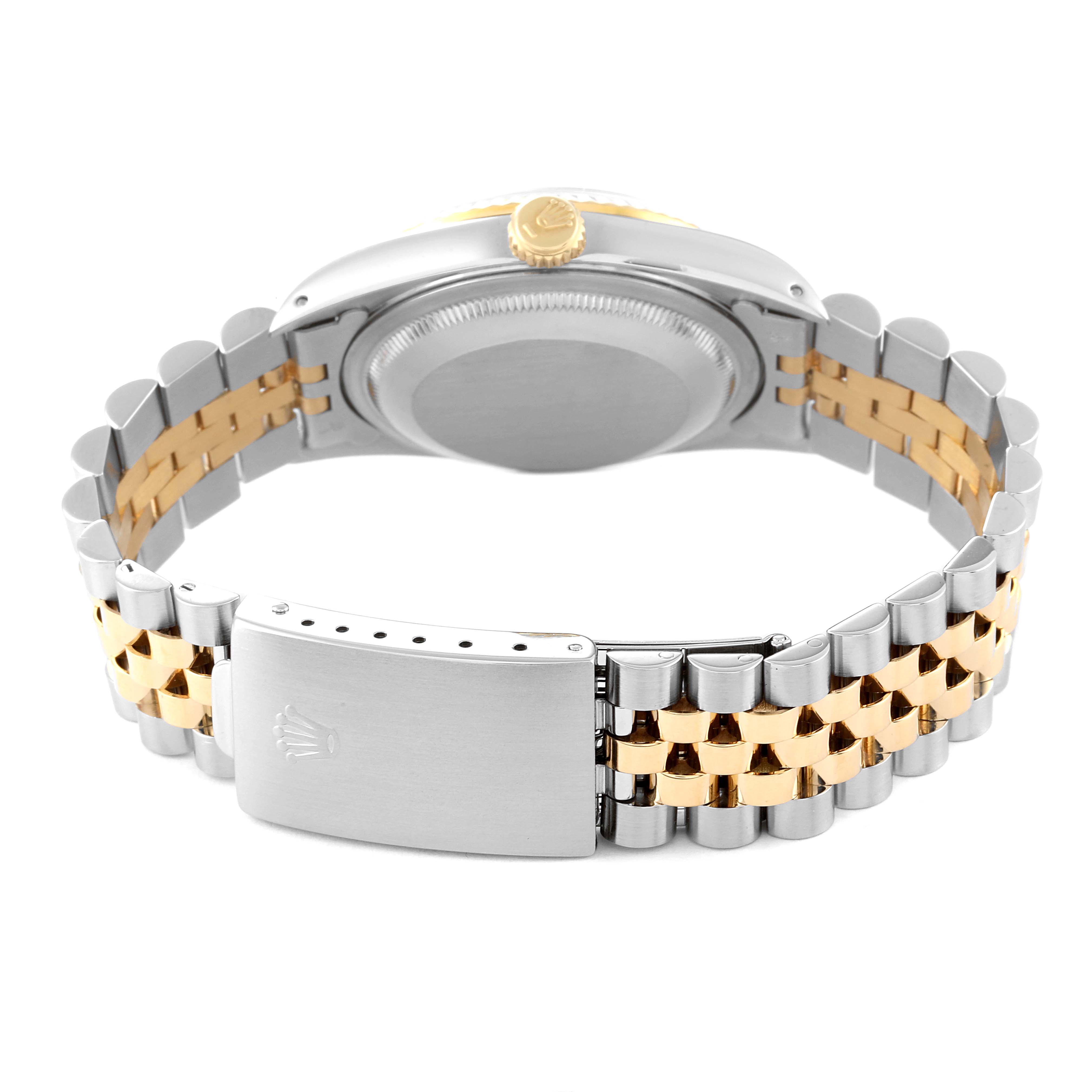 This image of the Rolex Datejust 16233 Men's Steel and Gold (two tone) Beige Dial 16233 Men's Steel and Gold (two tone) Beige Dial shows the back case, crown, and two-tone Jubilee bracelet with the clasp.