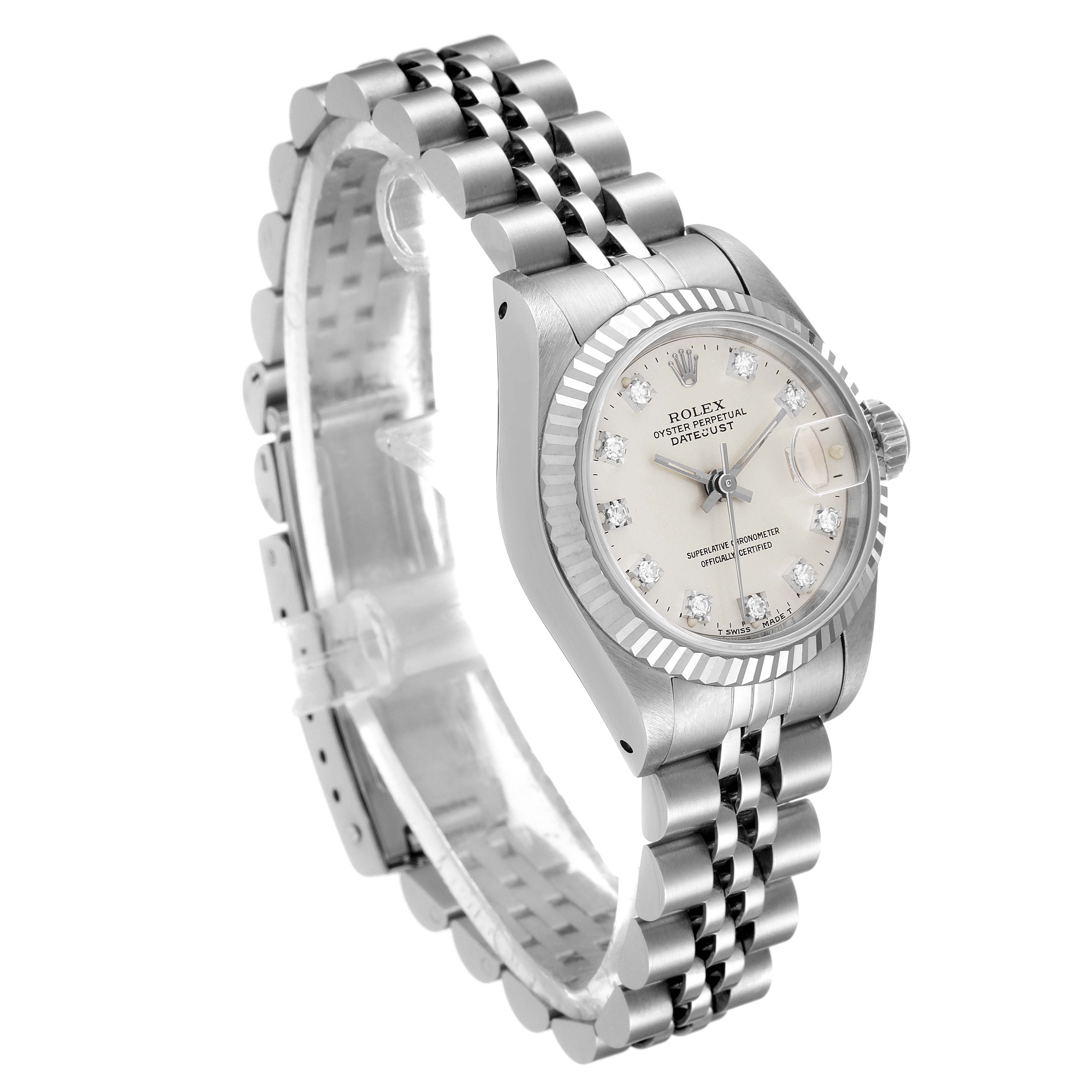 The Rolex Datejust 69174 Women
s Stainless Steel Silver Dial 69174 Women
s Stainless Steel Silver Dial watch is shown at an angled side view, highlighting its silver bracelet, fluted bezel, and diamond-accented dial.