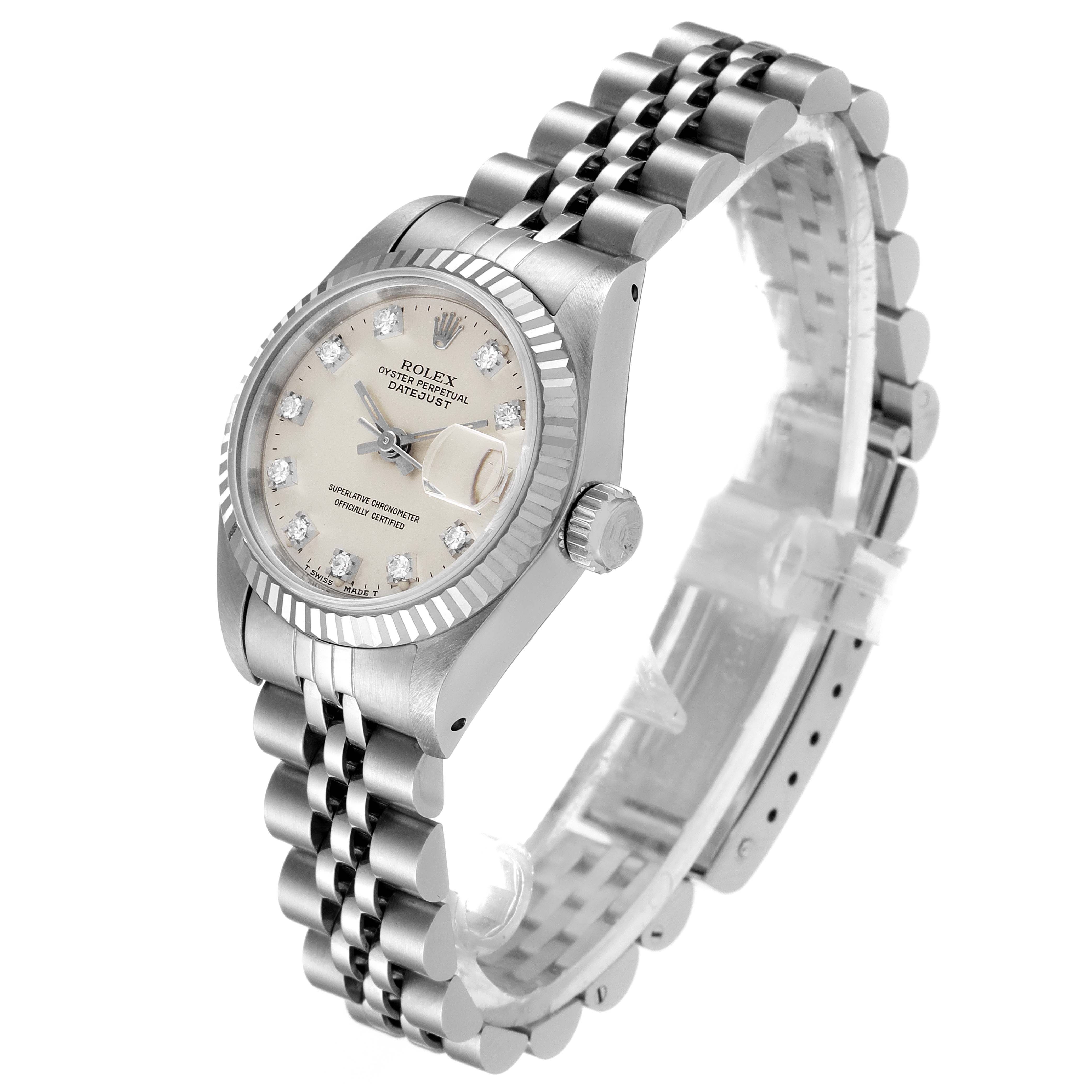 The image shows a side angle view of the Rolex Datejust 69174 Women
s Stainless Steel Silver Dial 69174 Women
s Stainless Steel Silver Dial watch, displaying its face, band, and crown.