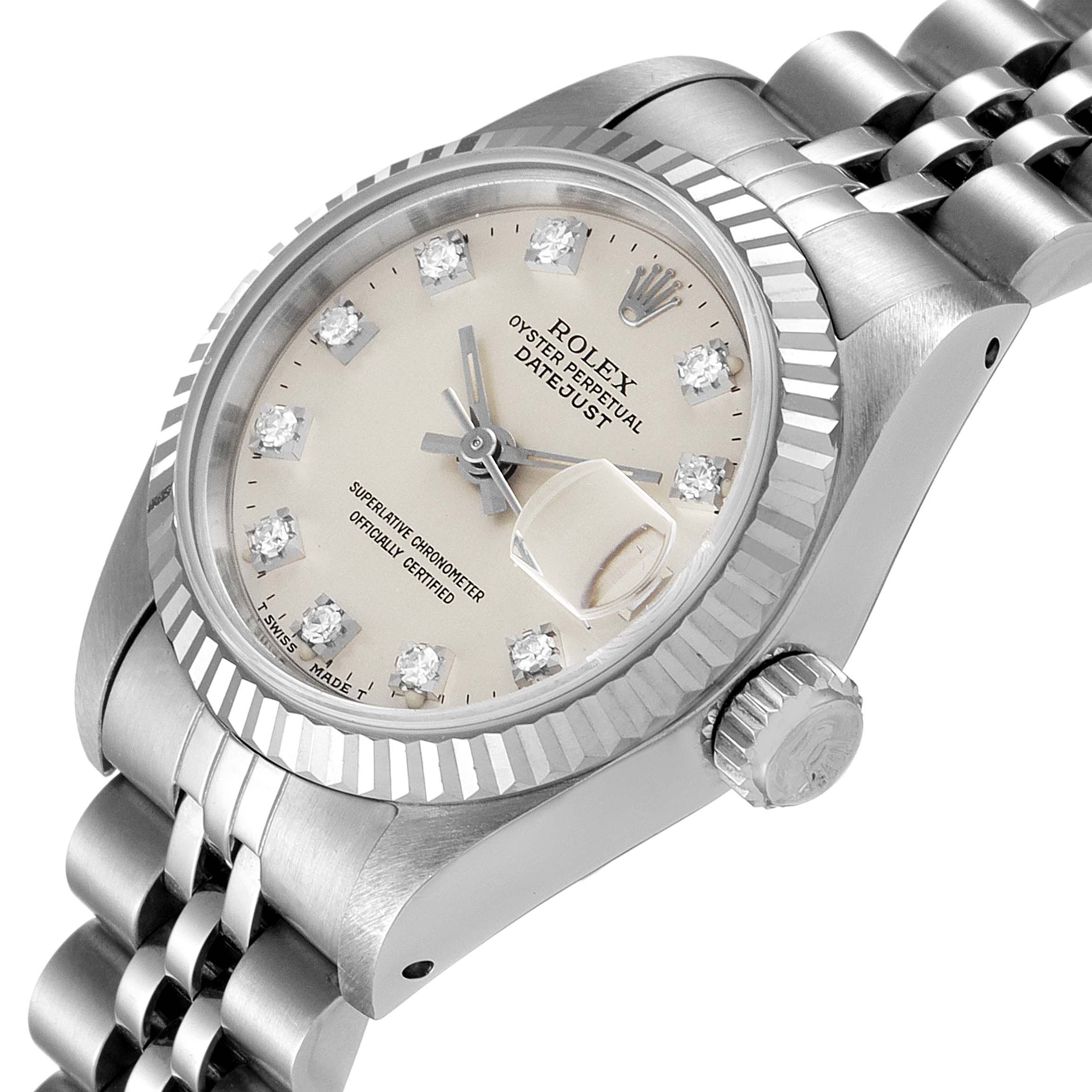The image shows a Rolex Datejust 69174 Women
s Stainless Steel Silver Dial 69174 Women
s Stainless Steel Silver Dial watch at a tilted angle, displaying the dial, crown, and part of the bracelet.