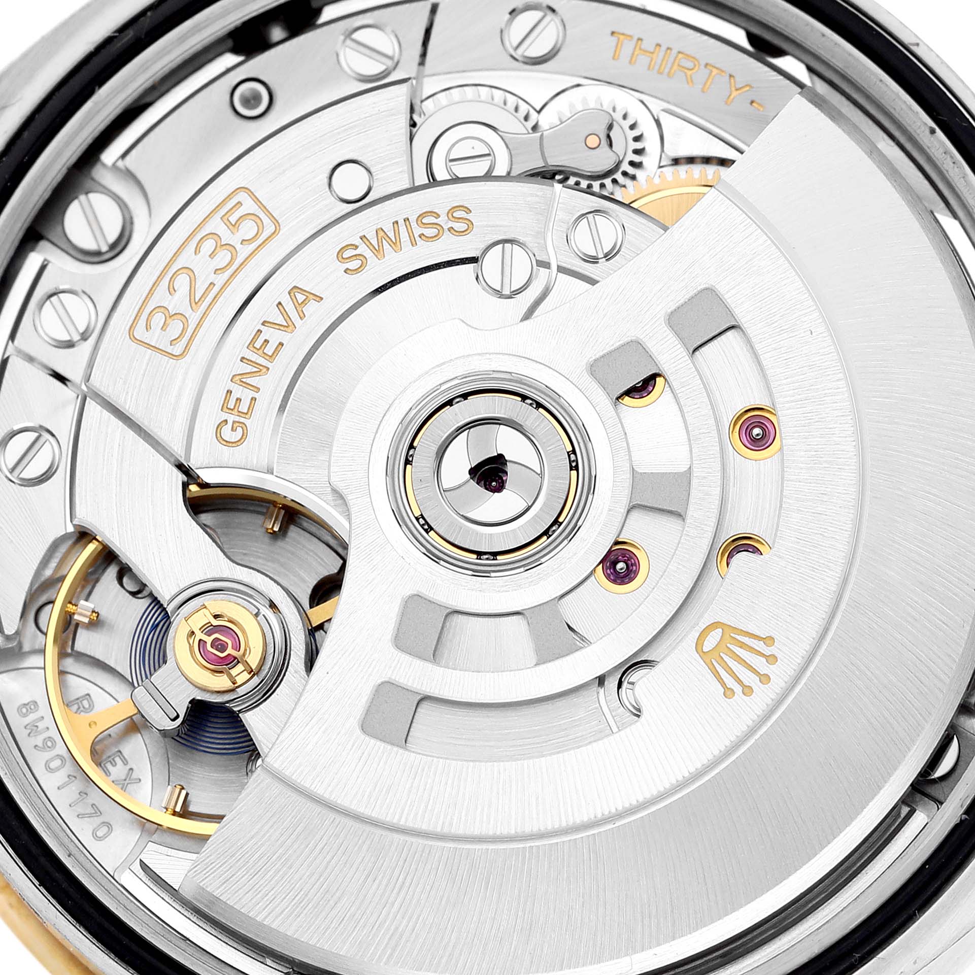This image shows a close-up view of the Rolex Datejust 126233 Men's Steel and Gold (two tone) Black Dial 126233 Men's Steel and Gold (two tone) Black Dial 3235 movement and internal components.