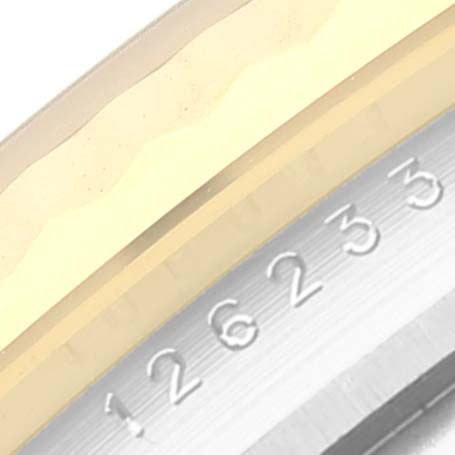 This is a close-up view of the bezel numbers on a Rolex Datejust 126233 Men's Steel and Gold (two tone) Black Dial 126233 Men's Steel and Gold (two tone) Black Dial watch.