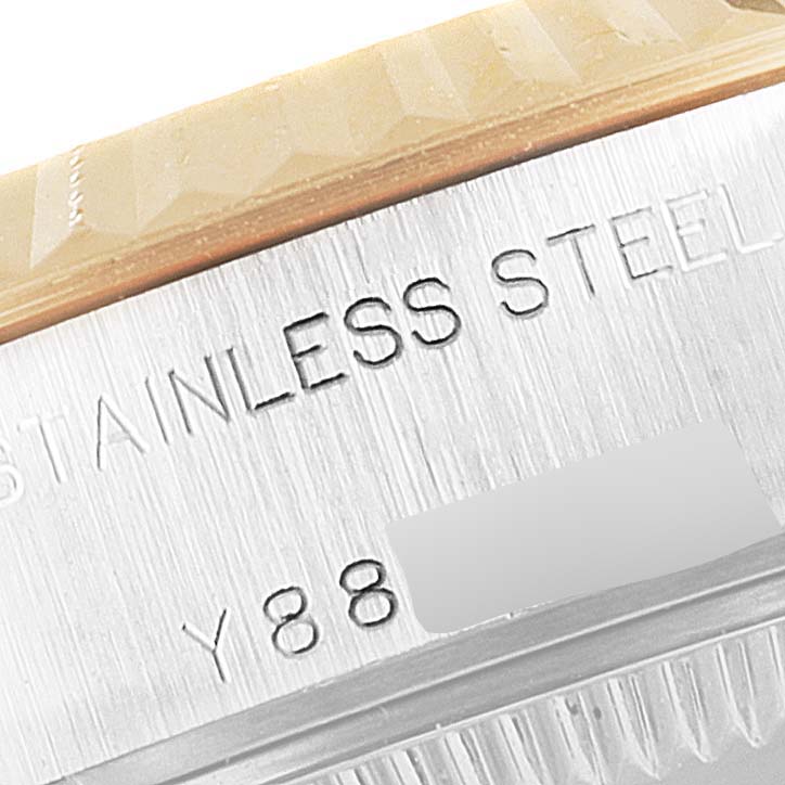 The image shows a close-up of the stainless steel casing and serial number engraving on a Rolex Datejust 79173 Women's Steel and Gold (two tone) Blue Dial 79173 Women's Steel and Gold (two tone) Blue Dial watch.