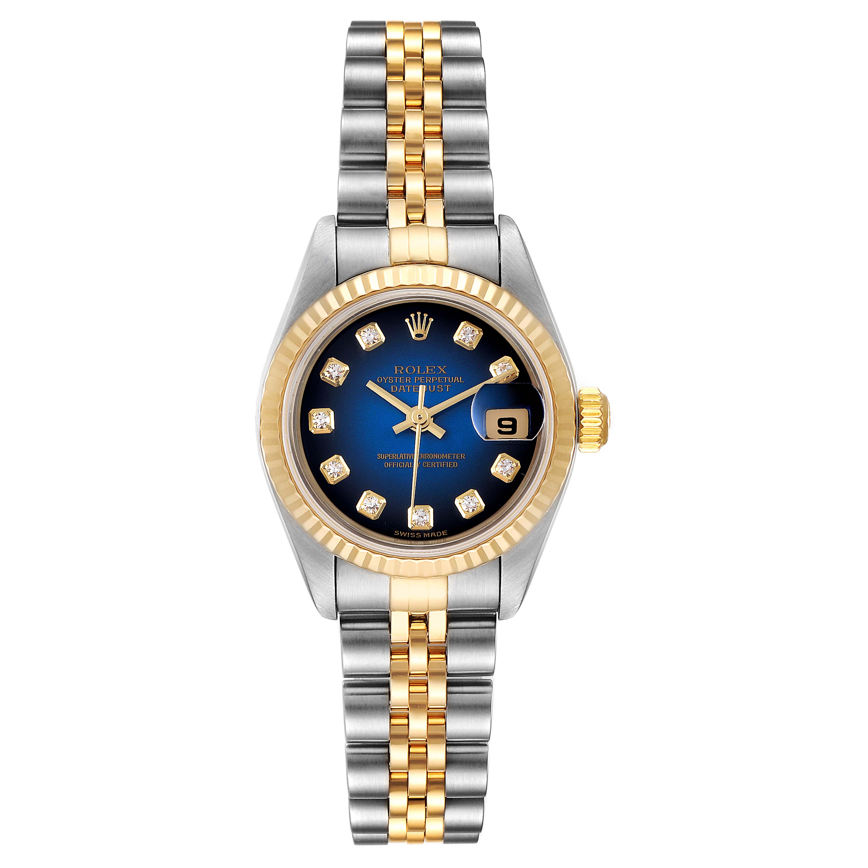 This image shows a Rolex Datejust 79173 Women's Steel and Gold (two tone) Blue Dial 79173 Women's Steel and Gold (two tone) Blue Dial watch from a top-down angle, highlighting its bracelet, bezel, and dial.