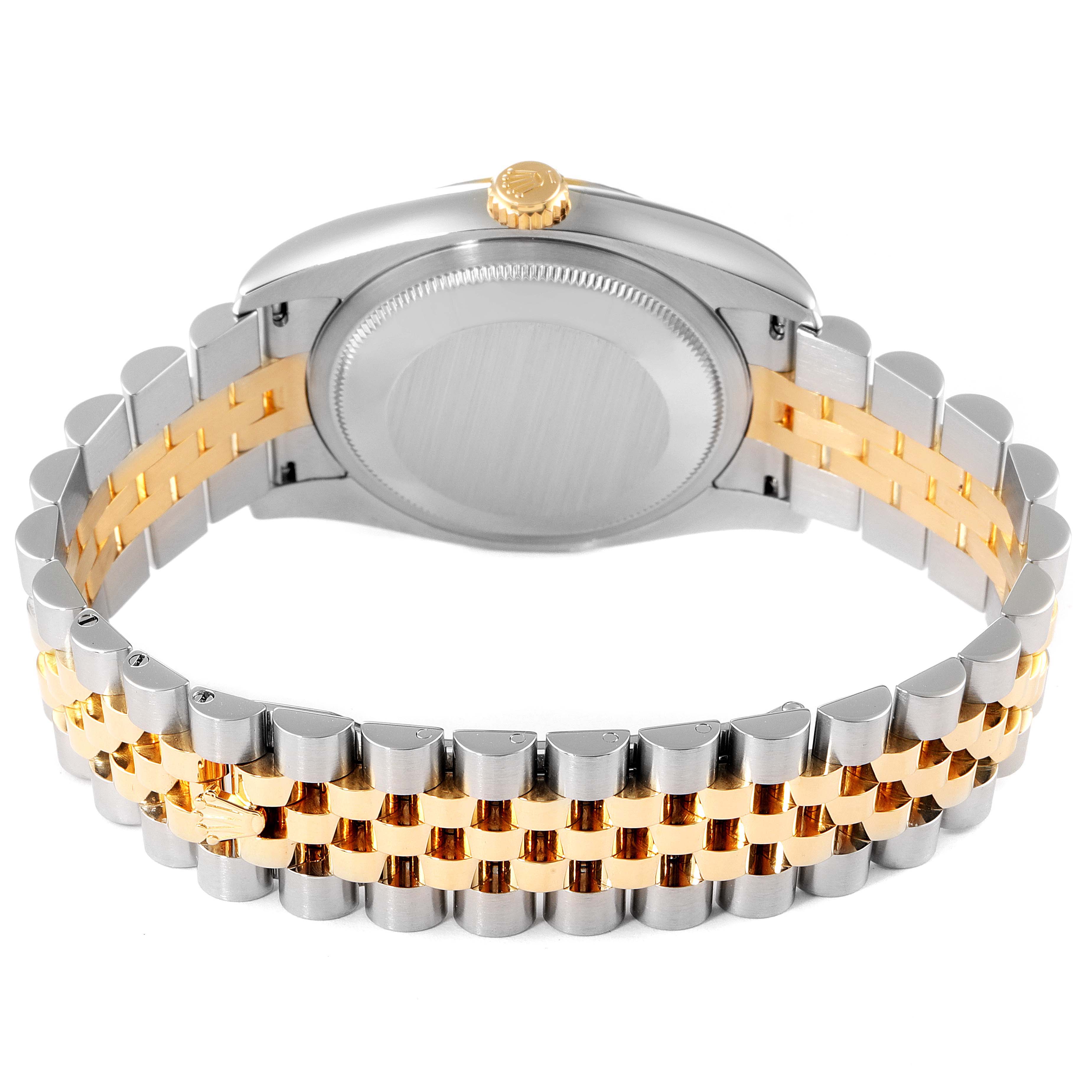 The image shows the back and bracelet of a Rolex Datejust 116233 Men's Steel and Gold (two tone) Black Dial 116233 Men's Steel and Gold (two tone) Black Dial watch, highlighting the two-tone metal band.
