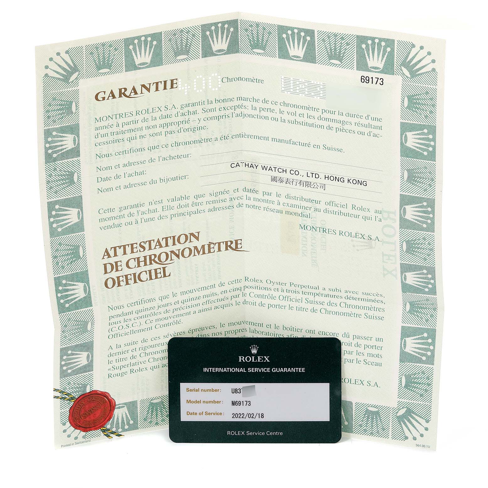 The image shows an authentication certificate and an international service guarantee card for the Rolex Datejust 69173 Women's Steel and Gold (two tone) Champagne Dial 69173 Women's Steel and Gold (two tone) Champagne Dial model.