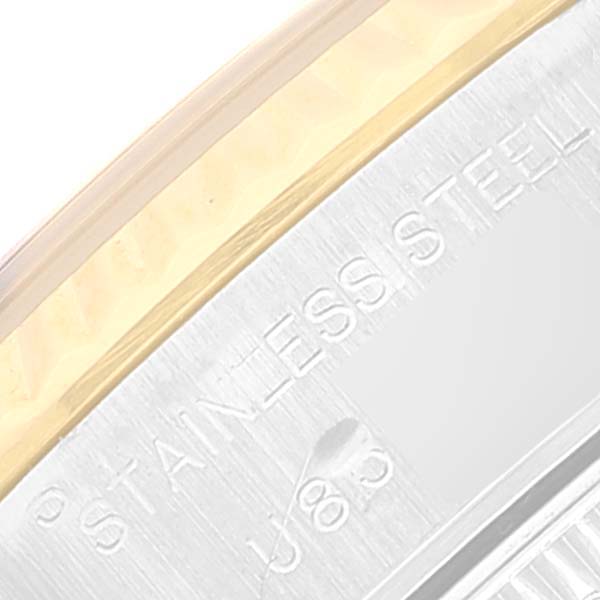 The image shows a close-up of the stainless steel and gold bezel of a Rolex Datejust 69173 Women's Steel and Gold (two tone) Champagne Dial 69173 Women's Steel and Gold (two tone) Champagne Dial watch.