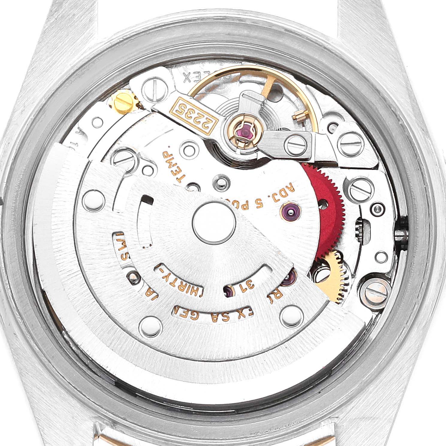 This image shows a close-up of the movement and inner mechanism of a Rolex Datejust 79173 Women's Steel and Gold (two tone) Champagne Dial 79173 Women's Steel and Gold (two tone) Champagne Dial watch.