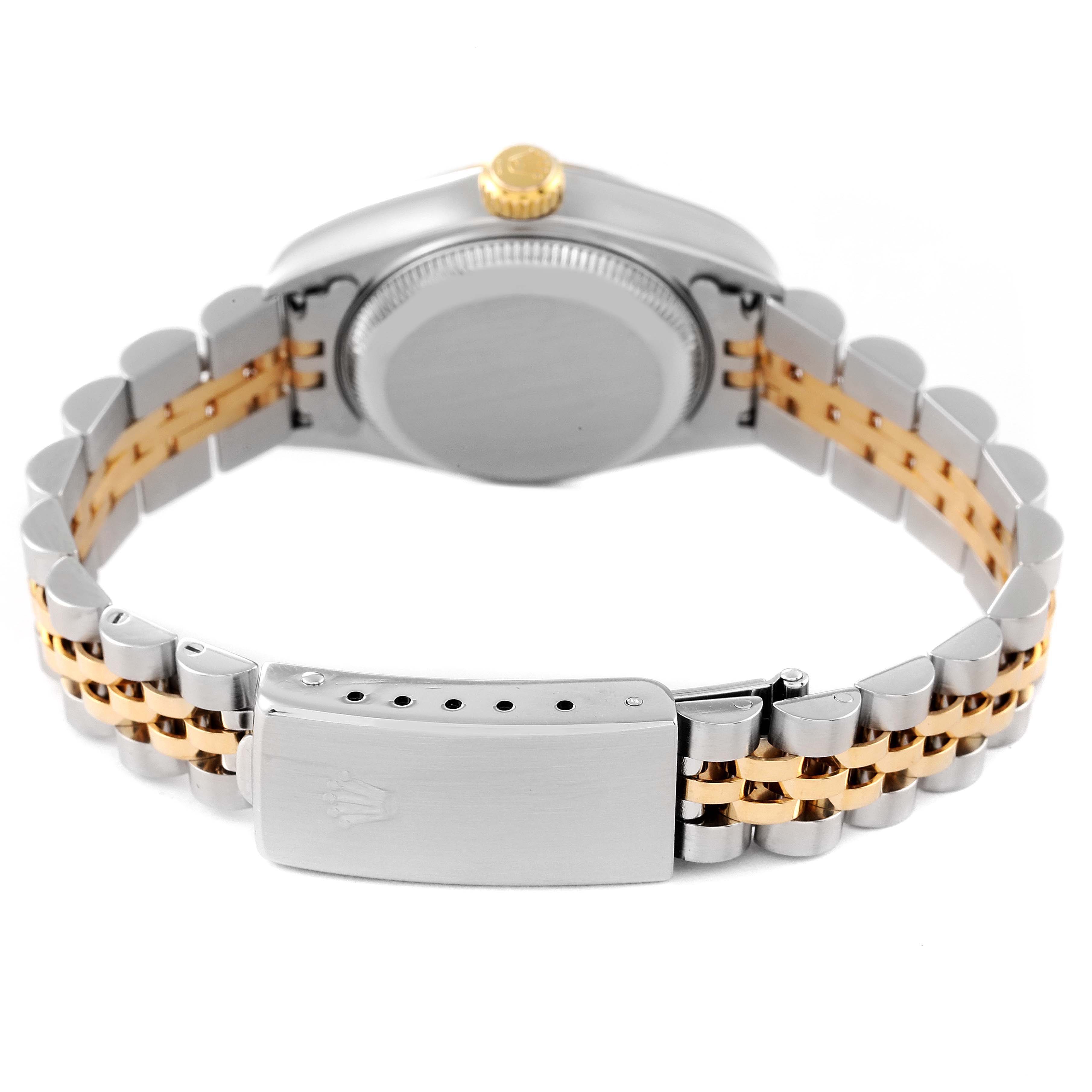 This image shows the back view of a Rolex Datejust 79173 Women's Steel and Gold (two tone) Champagne Dial 79173 Women's Steel and Gold (two tone) Champagne Dial watch, focusing on the case back and the two-tone bracelet with the clasp.