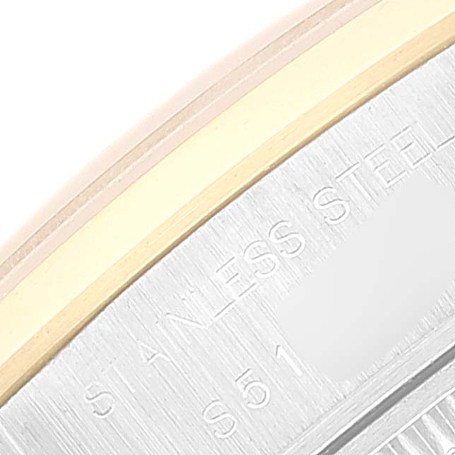 The image shows a close-up of the stainless steel back and edge of the bezel of a Rolex Datejust 69163 Women's Steel and Gold (two tone) Grey Dial 69163 Women's Steel and Gold (two tone) Grey Dial watch.