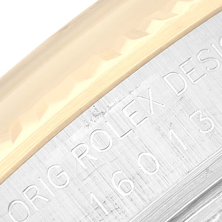 This image shows a close-up angle of the engravings on the case of a Vintage Collection Rolex watch.