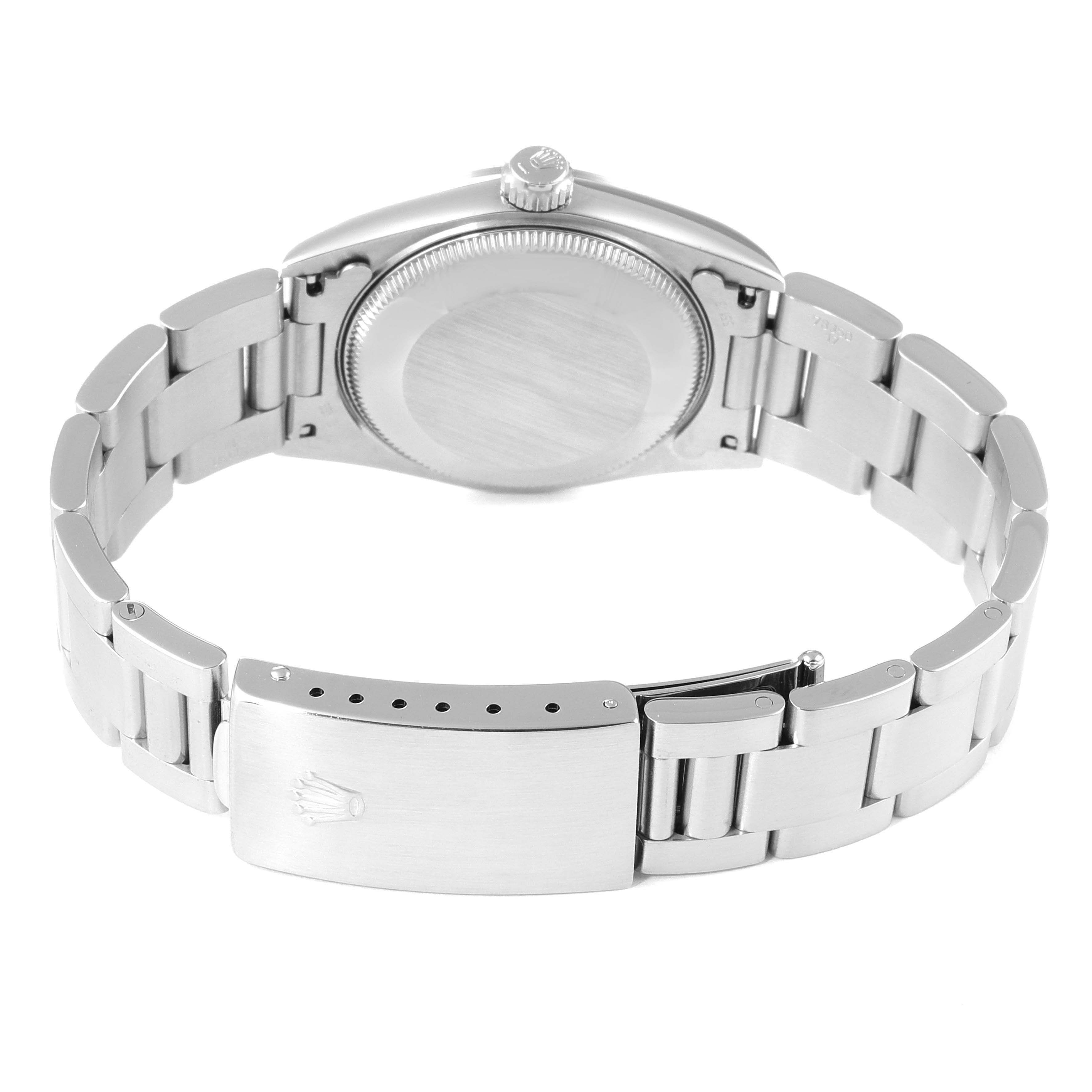 This image shows the back view of a Rolex Mid-Size 67480 Women's Stainless Steel Pink Dial 67480 Women's Stainless Steel Pink Dial watch, featuring its stainless steel case, bracelet, and clasp.