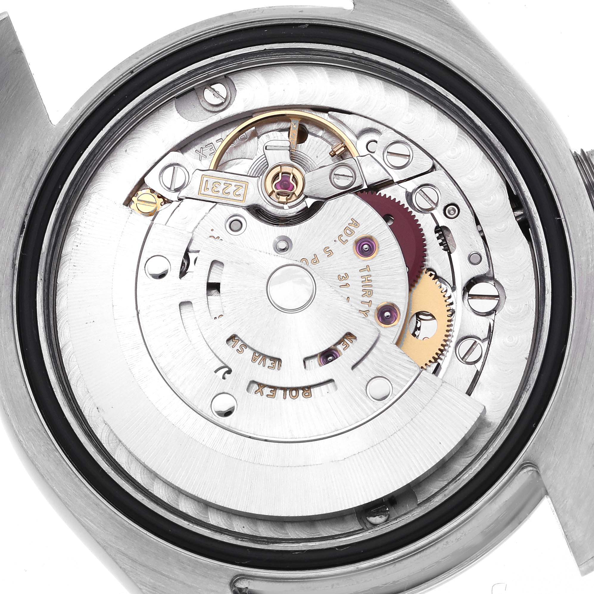 The image shows the internal mechanism of a Rolex Mid-Size 177200 Women's Stainless Steel Black Dial 177200 Women's Stainless Steel Black Dial watch viewed from the back, displaying gears and the rotor.