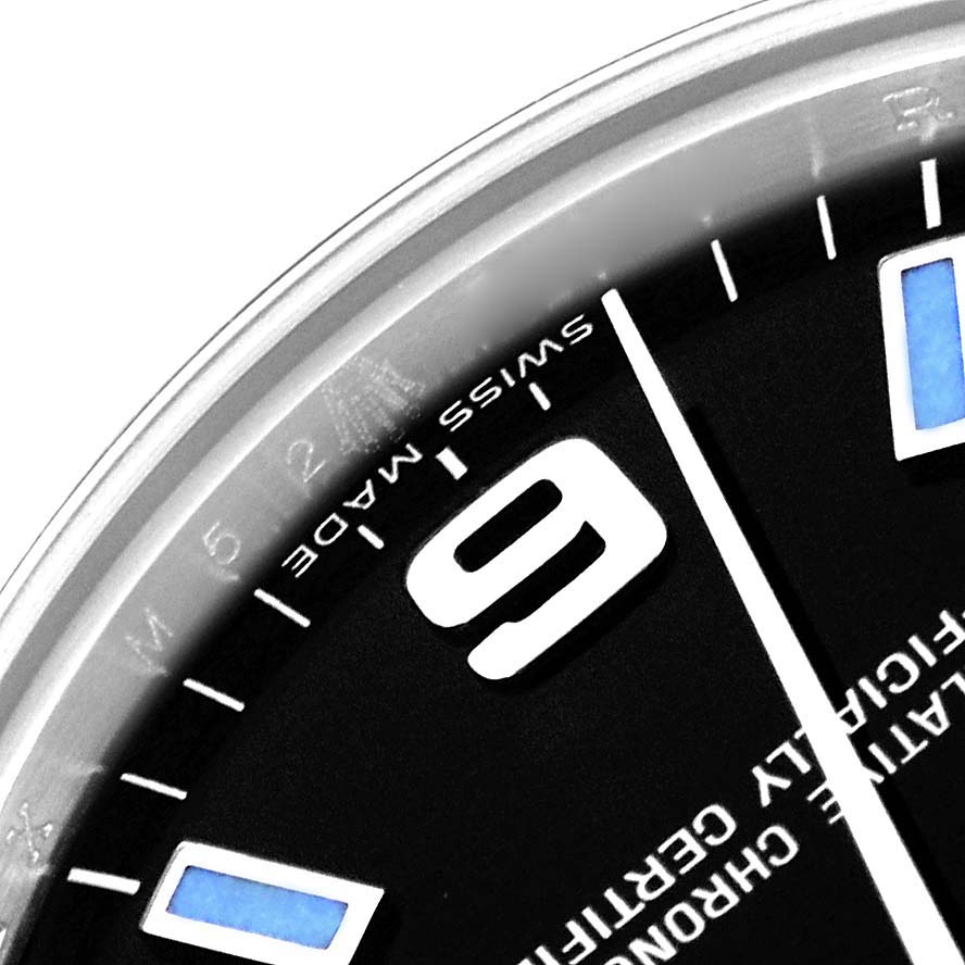 The image shows a close-up of the watch face of a Rolex Mid-Size 177200 Women's Stainless Steel Black Dial 177200 Women's Stainless Steel Black Dial model, displaying numbers and partial text.