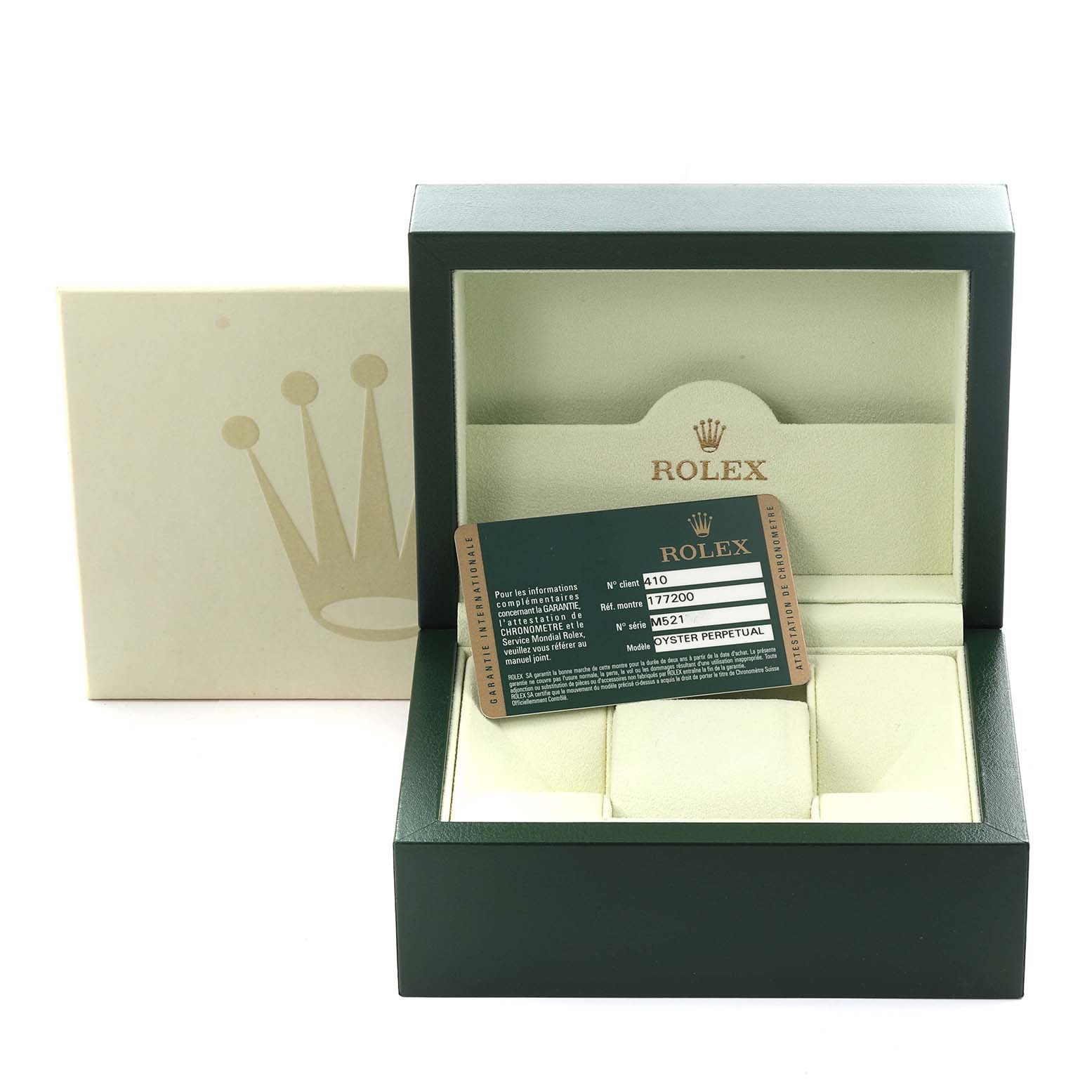 The image shows an open Rolex watch box for a Mid-Size model, featuring the warranty card and outer packaging.