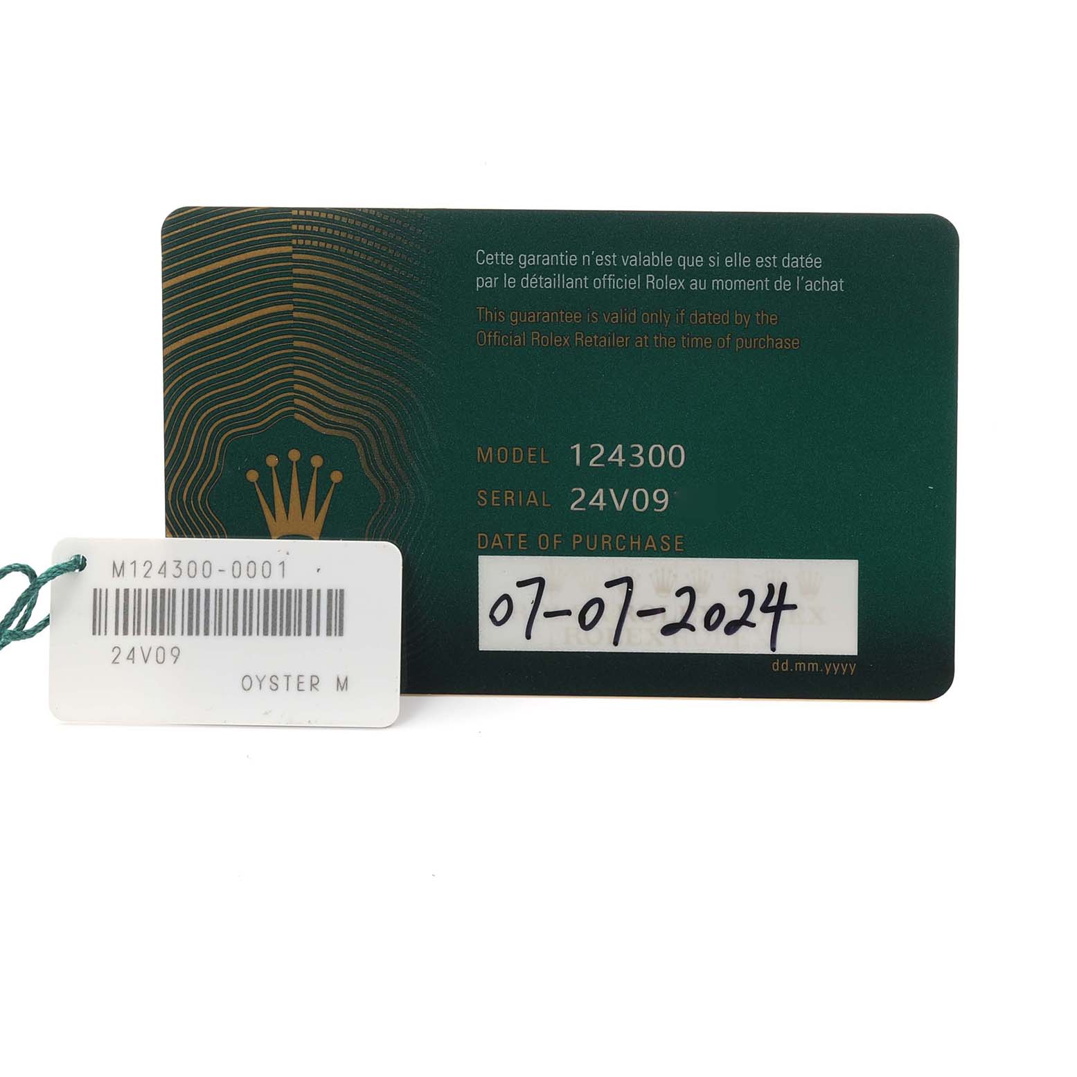 The image shows the warranty card and tag for the Rolex Oyster Perpetual 124300 Men's Stainless Steel Silver Dial 124300 Men's Stainless Steel Silver Dial, model 124300.