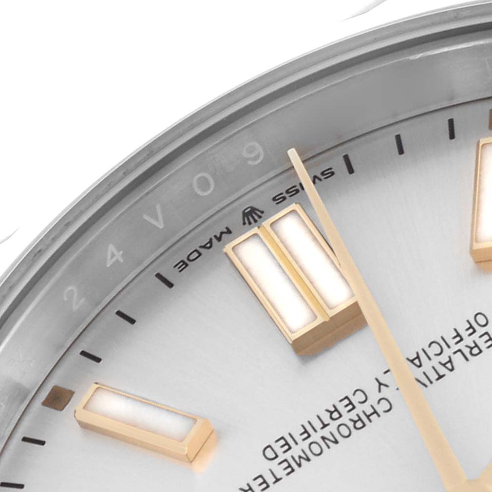 The image shows a close-up of the dial, markers, and hands of the Rolex Oyster Perpetual 124300 Men's Stainless Steel Silver Dial 124300 Men's Stainless Steel Silver Dial watch.