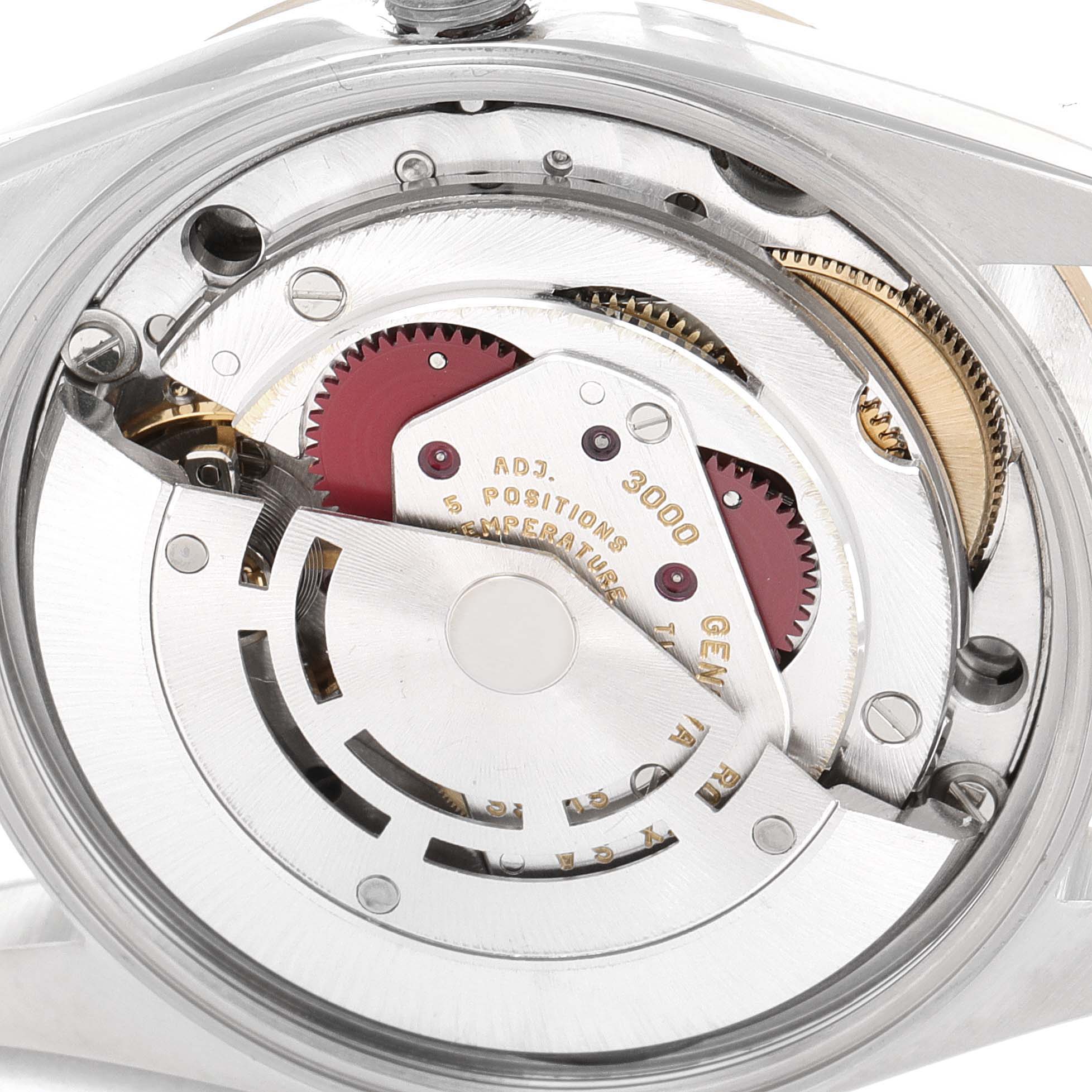 This image shows the internal mechanism and movement parts of a Rolex Oyster Perpetual 14203 Men
s Steel and Gold (two tone) Grey Dial 14203 Men
s Steel and Gold (two tone) Grey Dial watch from a close-up, top-down angle.