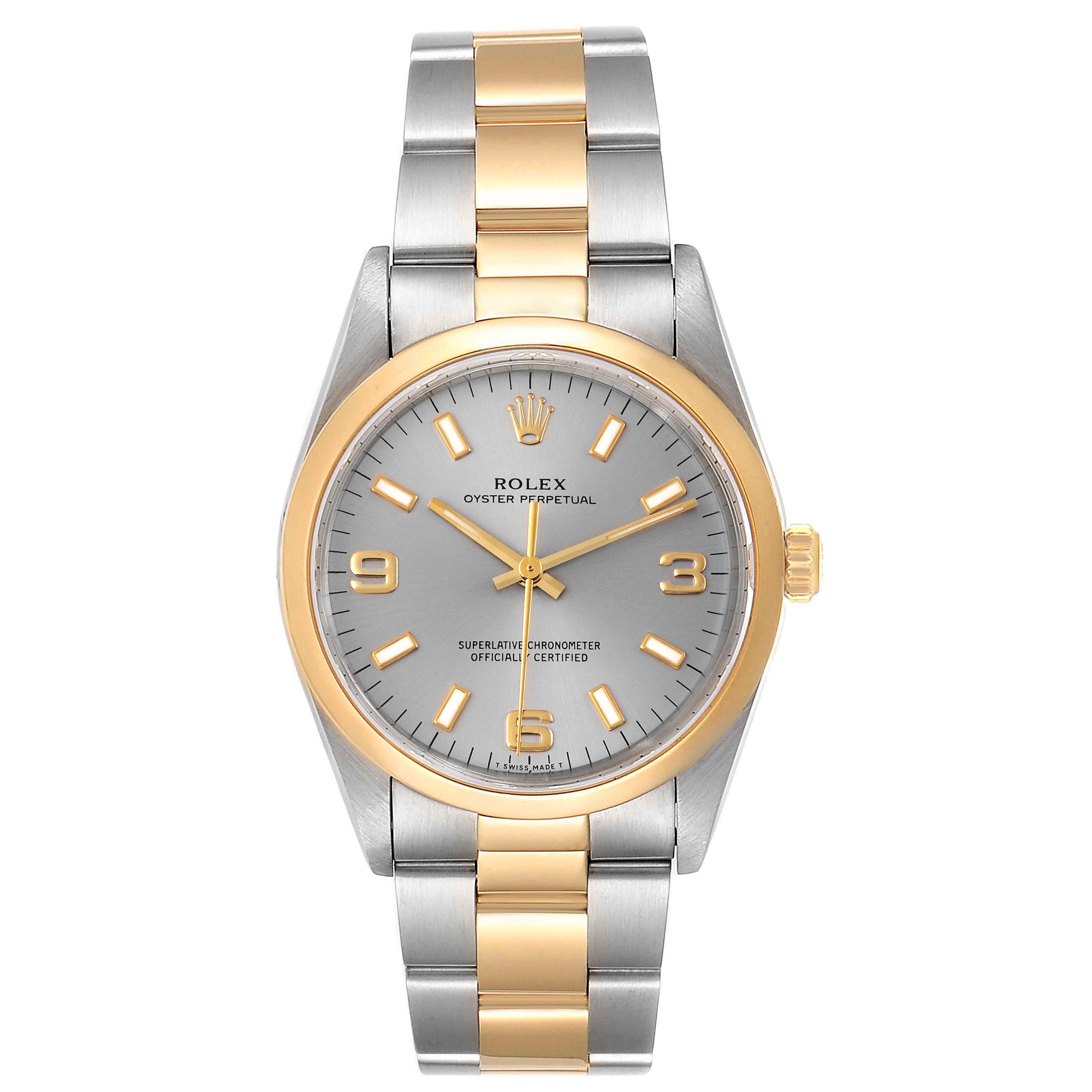 The image shows a front view of the Rolex Oyster Perpetual 14203 Men
s Steel and Gold (two tone) Grey Dial 14203 Men
s Steel and Gold (two tone) Grey Dial watch, displaying its dial, bezel, and bracelet.