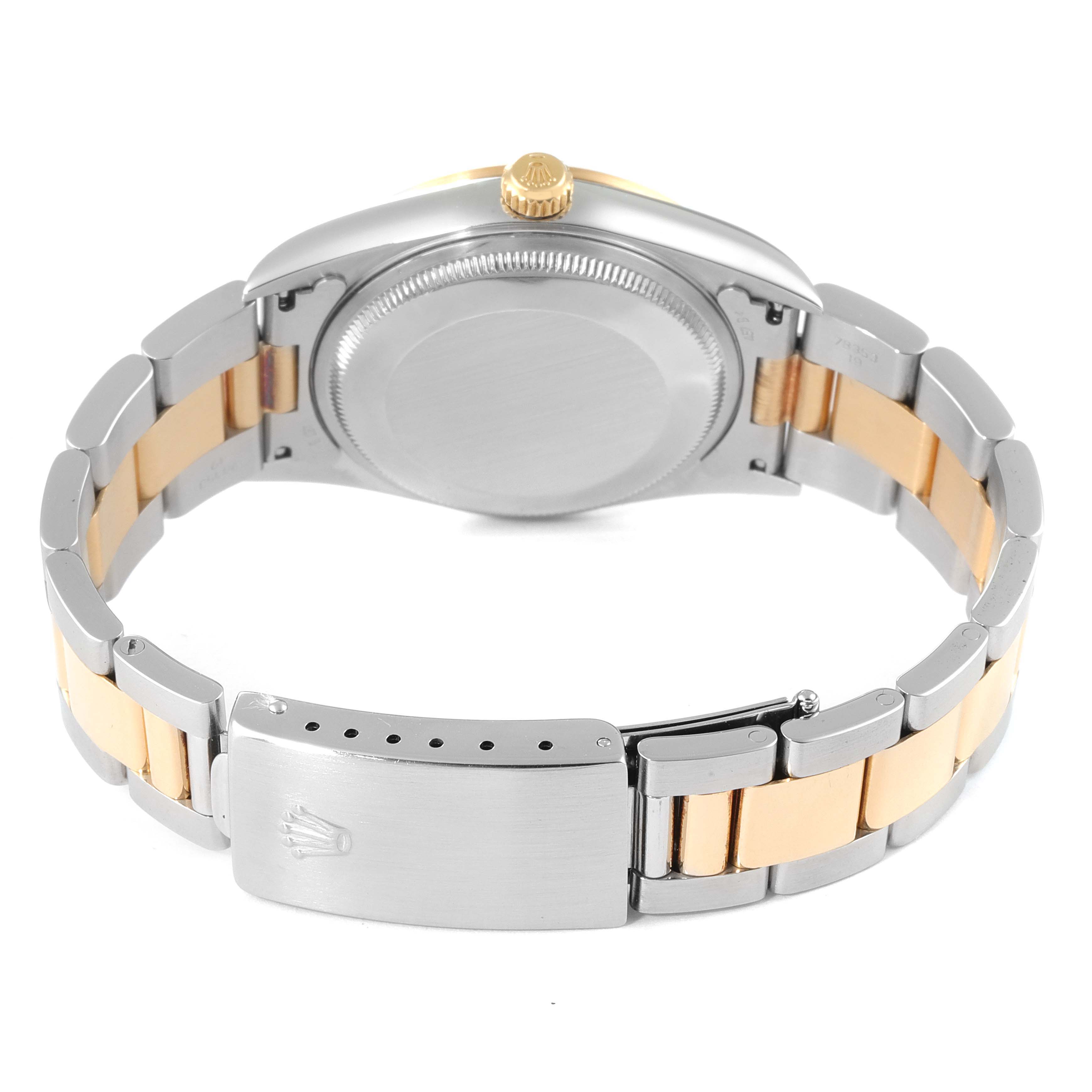 The image shows the back view of a Rolex Oyster Perpetual 14203 Men
s Steel and Gold (two tone) Grey Dial 14203 Men
s Steel and Gold (two tone) Grey Dial watch, highlighting its caseback, crown, and two-tone bracelet and clasp.