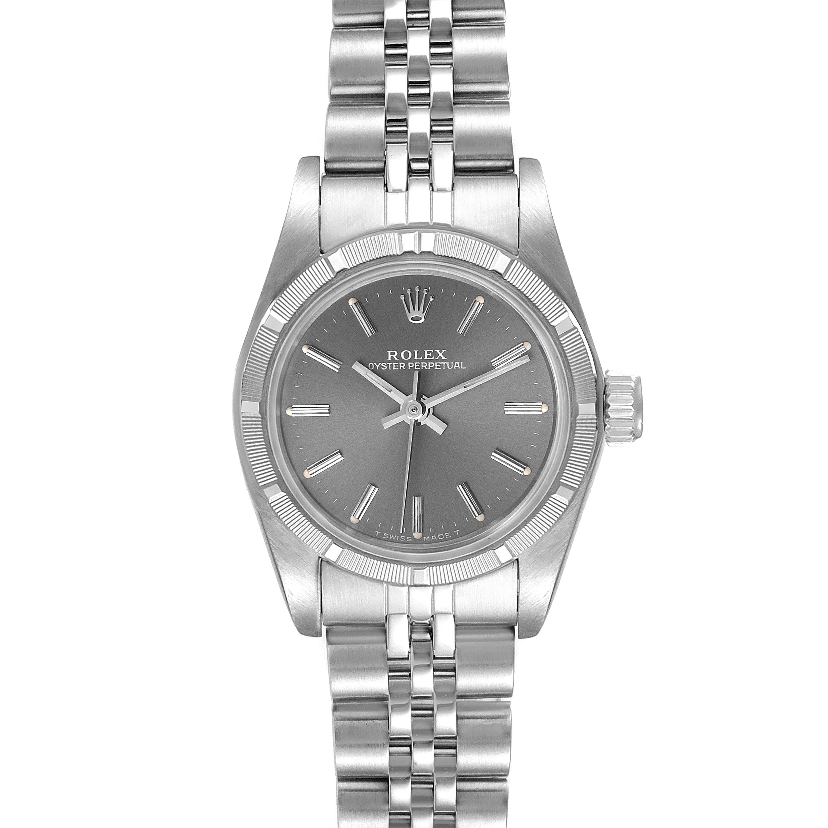 The image shows a front view of the Rolex Oyster Perpetual 67230 Women's Stainless Steel Grey Dial 67230 Women's Stainless Steel Grey Dial watch, highlighting its face, bezel, and bracelet.