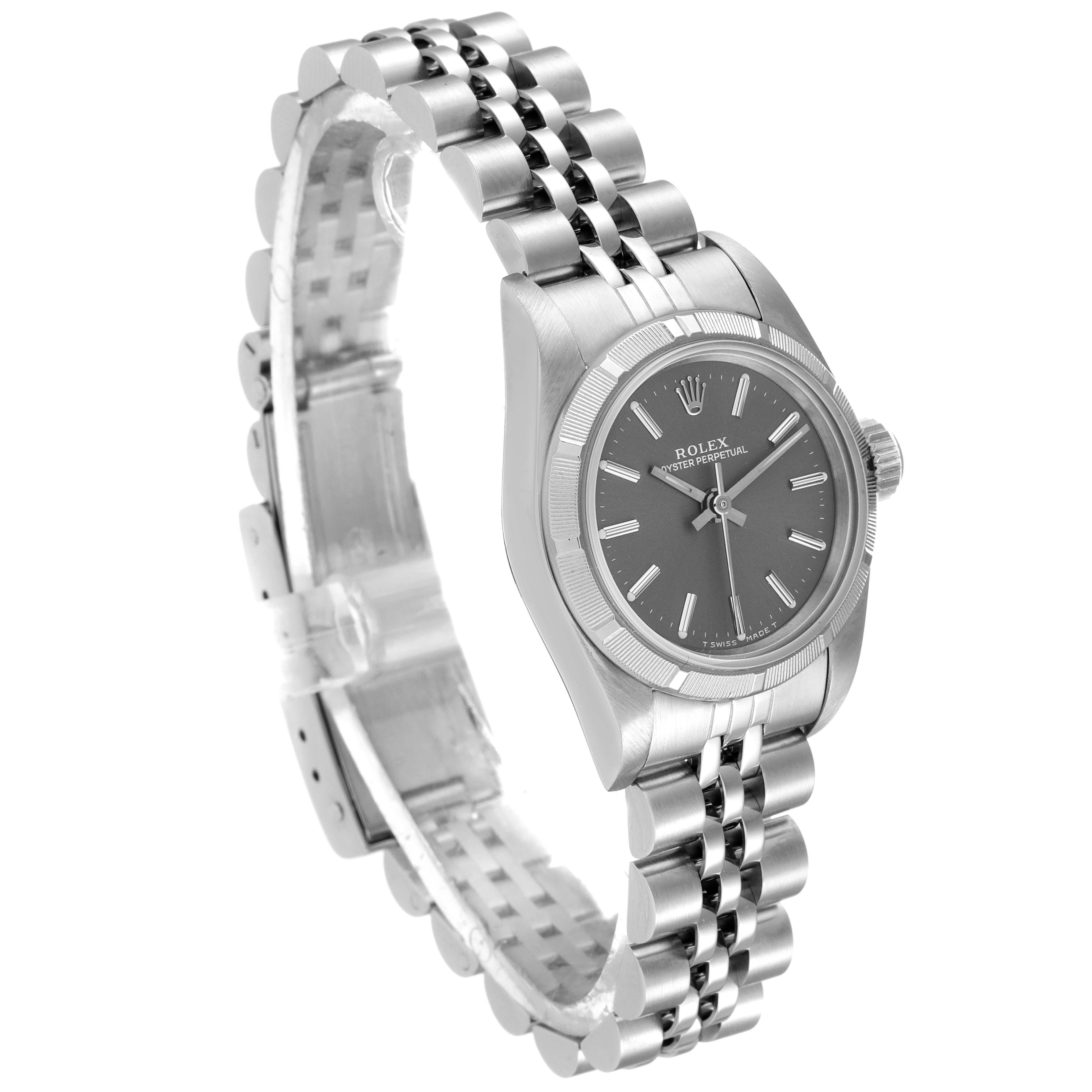 The image shows a Rolex Oyster Perpetual 67230 Women's Stainless Steel Grey Dial 67230 Women's Stainless Steel Grey Dial watch angled slightly from the side, highlighting the dial, case, and bracelet.