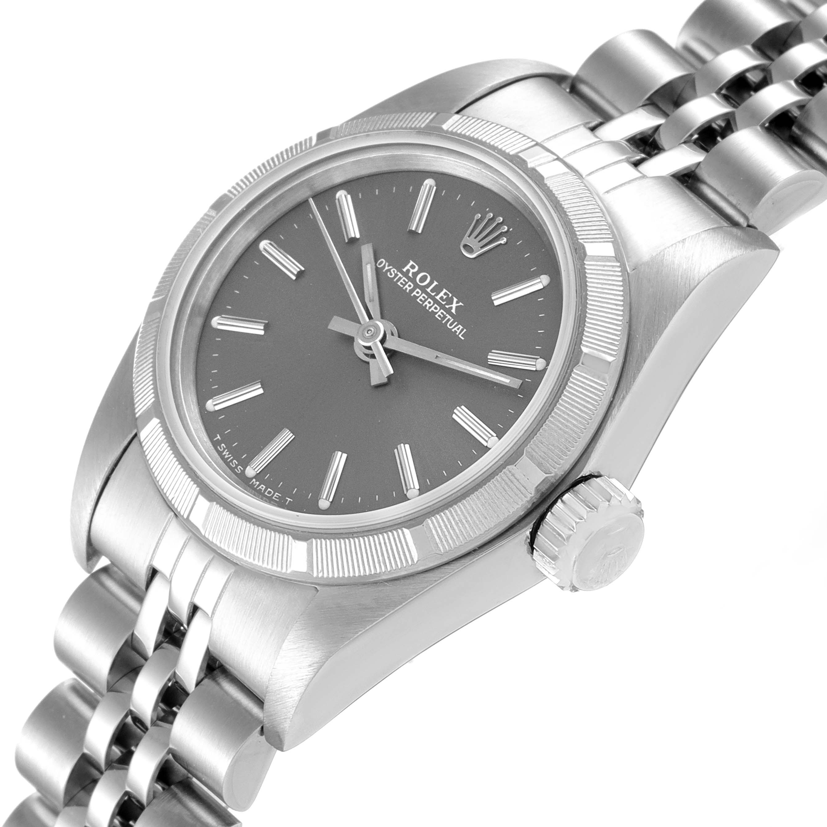 The Rolex Oyster Perpetual 67230 Women's Stainless Steel Grey Dial 67230 Women's Stainless Steel Grey Dial watch is shown at a slight angle, displaying the face, crown, and bracelet links.