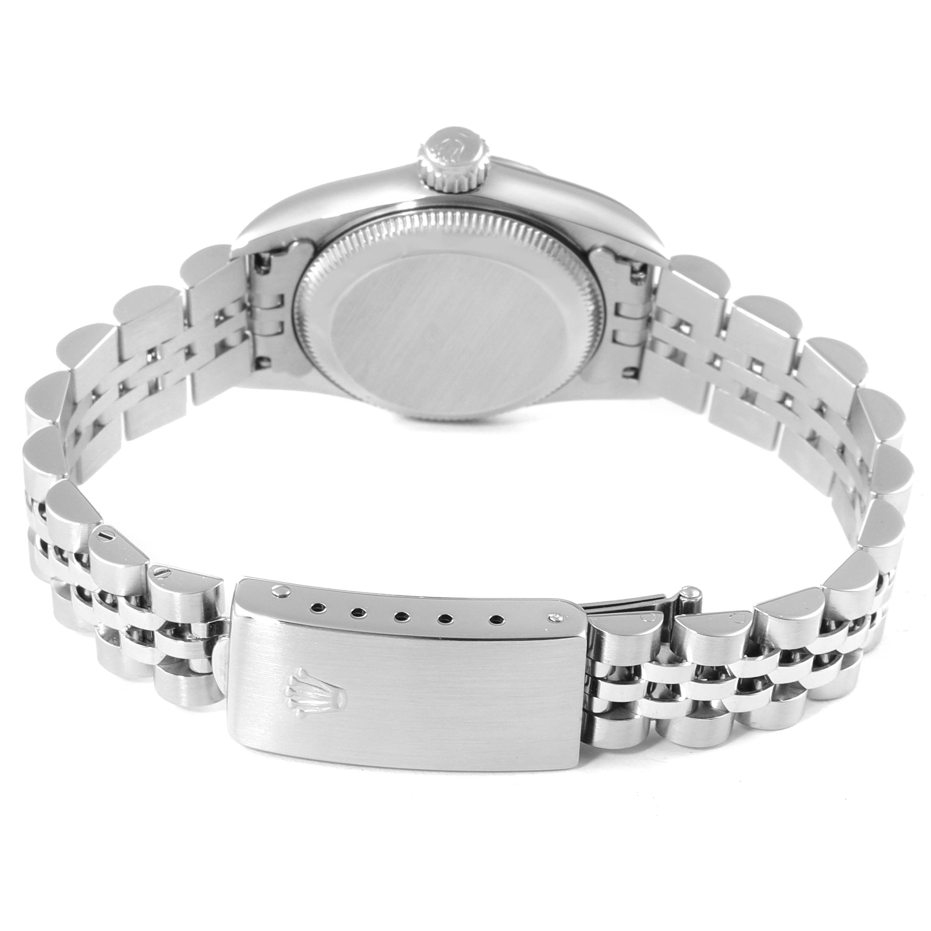 This image shows the back view of a Rolex Oyster Perpetual 67230 Women's Stainless Steel Grey Dial 67230 Women's Stainless Steel Grey Dial watch, highlighting the case back, crown, and bracelet with clasp.