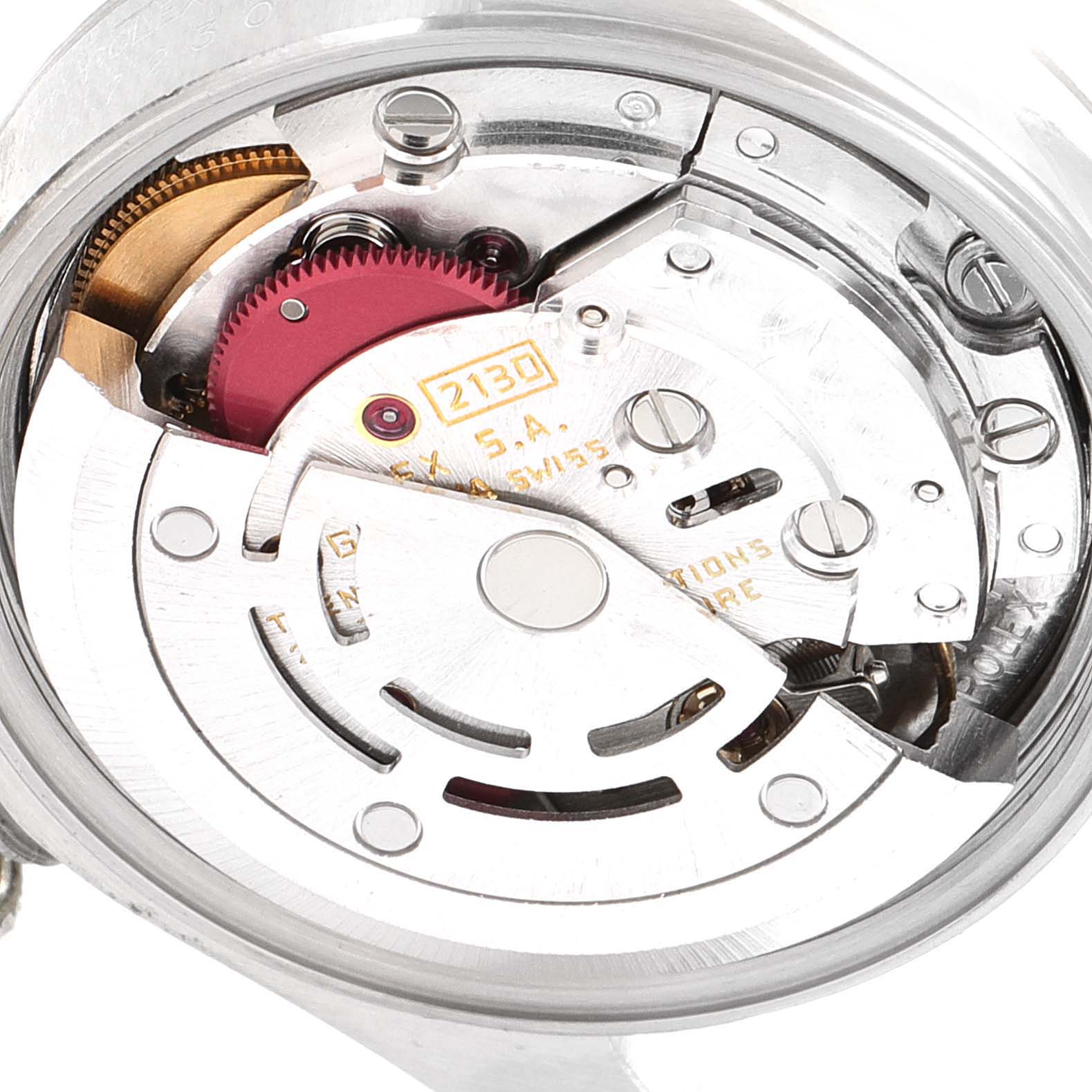 This image shows the open case back of a Rolex Oyster Perpetual 67230 Women's Stainless Steel Grey Dial 67230 Women's Stainless Steel Grey Dial watch, revealing its movement and internal mechanisms.