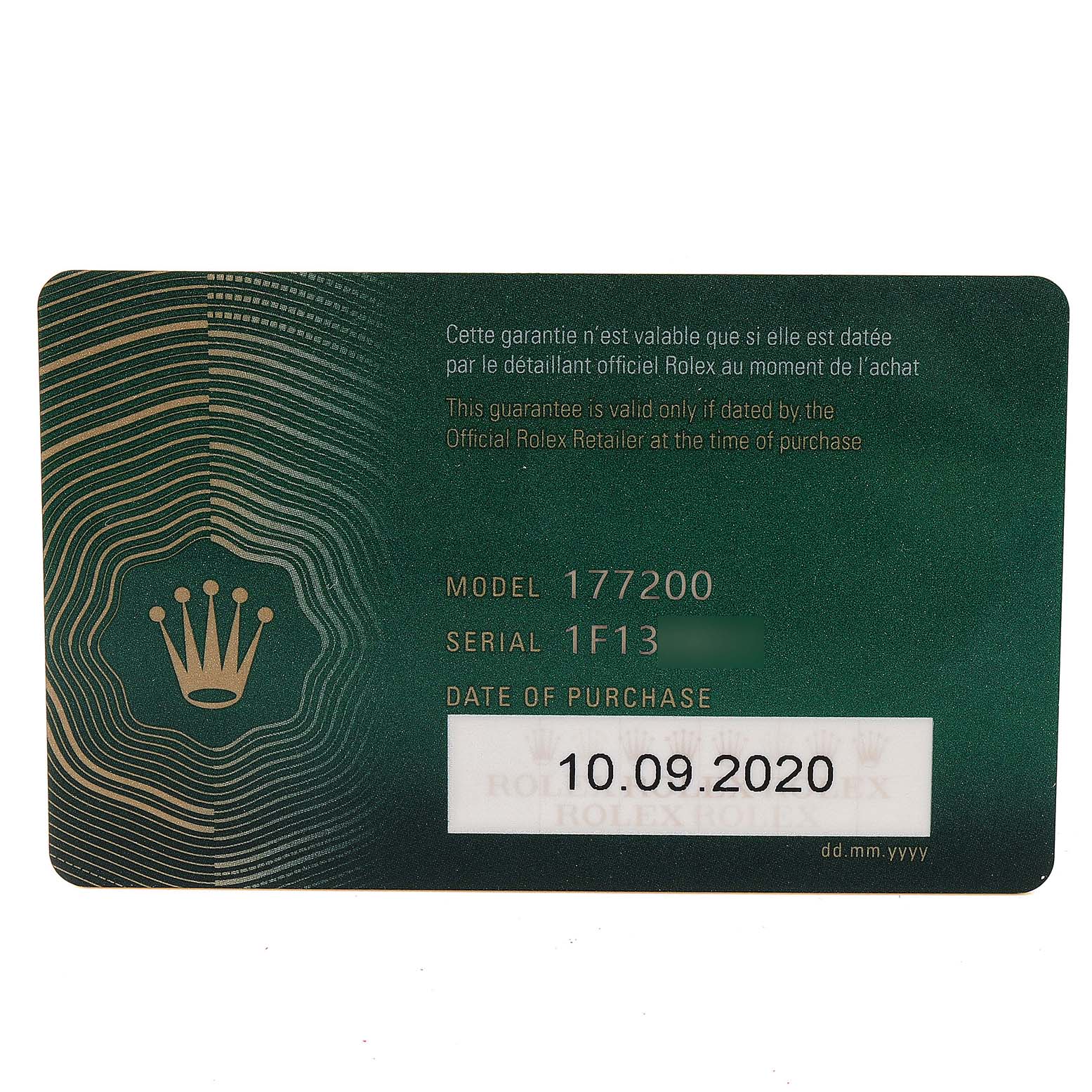 This image shows a guarantee card for a Rolex Mid-Size 177200 Women's Stainless Steel Grey Dial 177200 Women's Stainless Steel Grey Dial model 177200 with serial number and purchase date.
