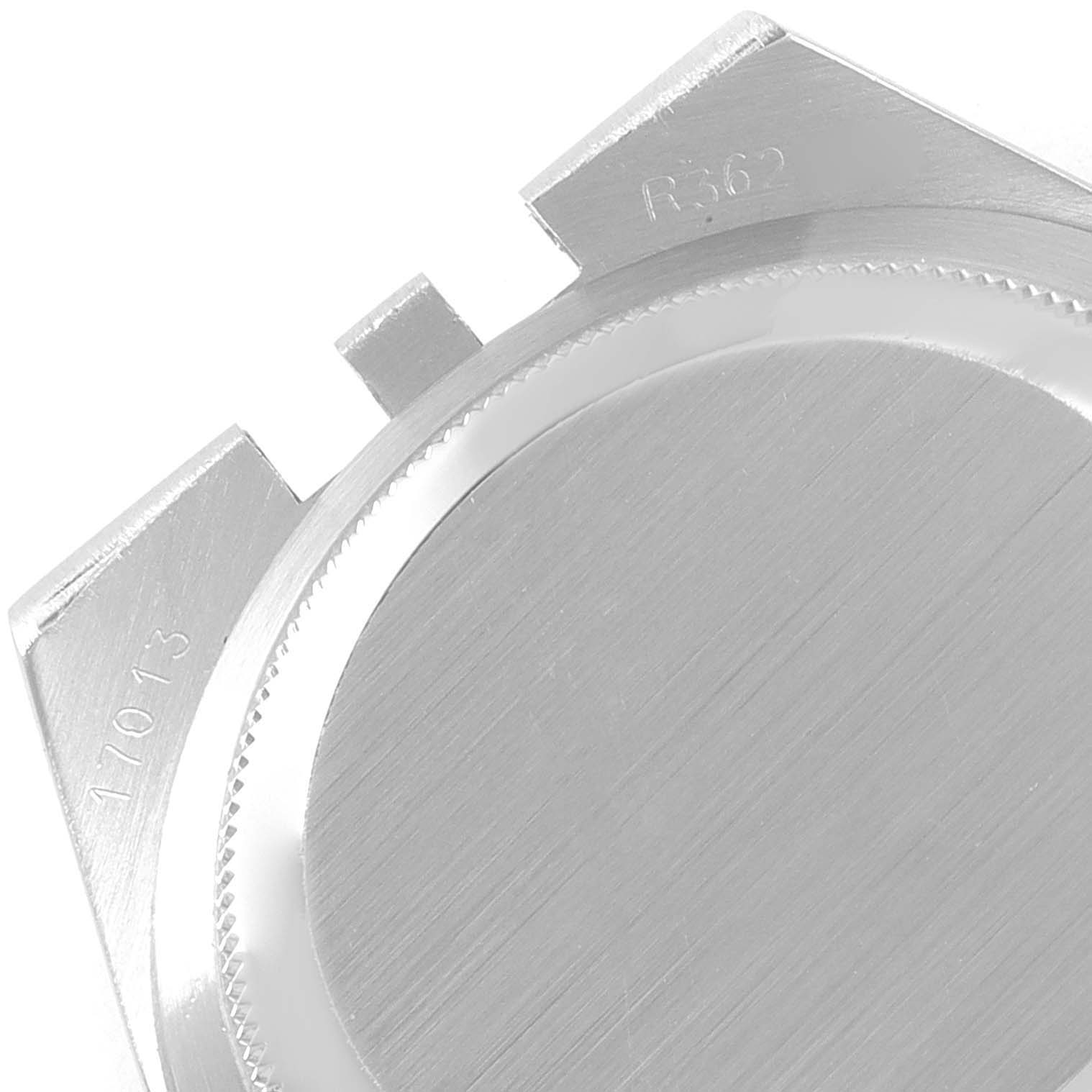 The image shows the case back of a Rolex Oysterquartz 17013 Men's Steel and Gold (two tone) Silver Dial 17013 Men's Steel and Gold (two tone) Silver Dial watch from an angled close-up view.