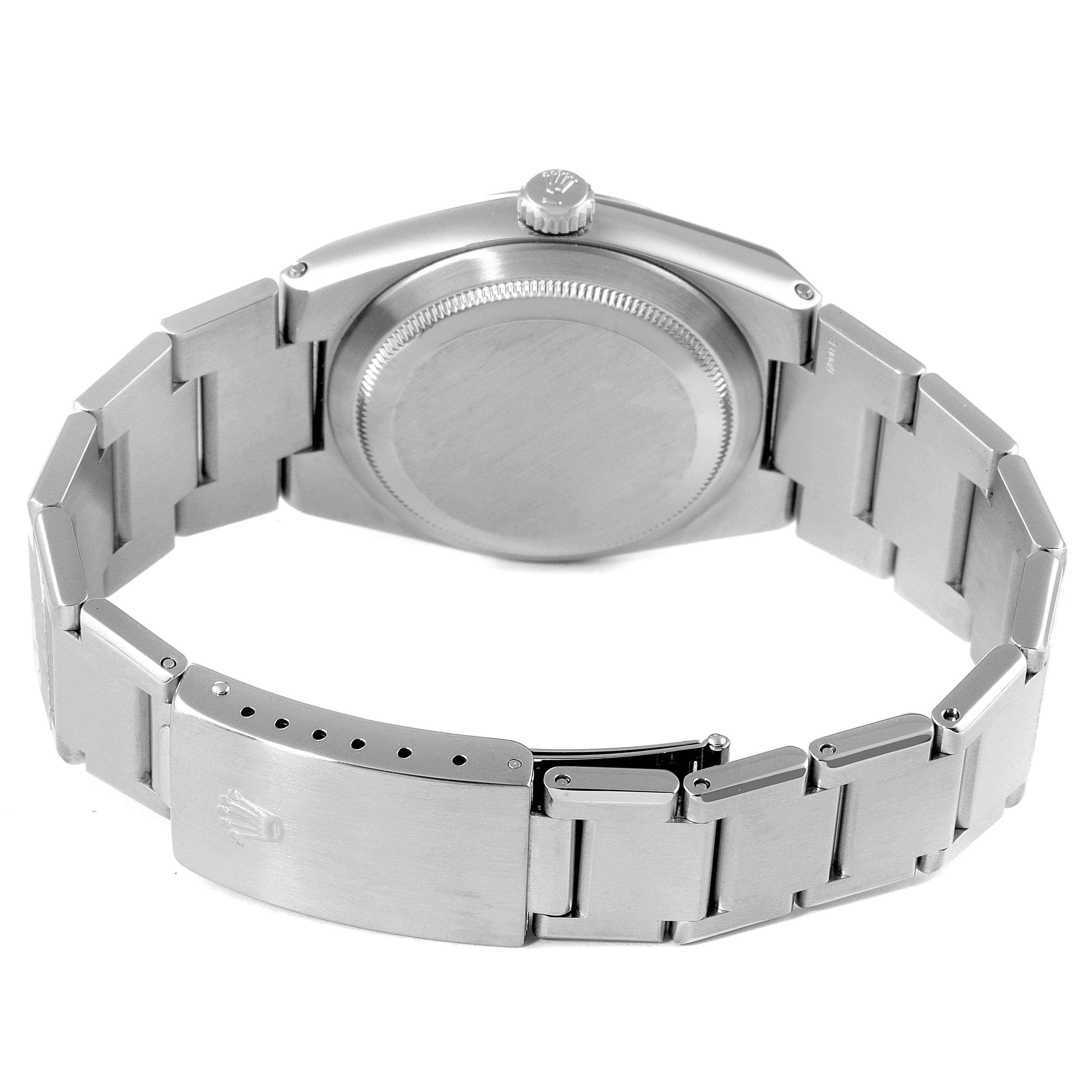 The image shows the back of a Rolex Oysterquartz 17000 Men's Stainless Steel Silver Dial 17000 Men's Stainless Steel Silver Dial watch, highlighting the case back, crown, and metal bracelet with clasp.