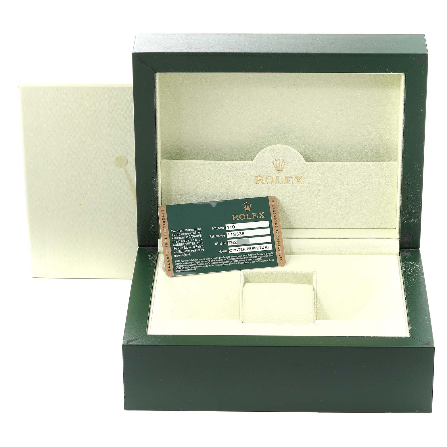 The image shows the open packaging box of a Rolex President 118339 Men's White Gold Black Dial 118339 Men's White Gold Black Dial model watch with an authenticity card inside.