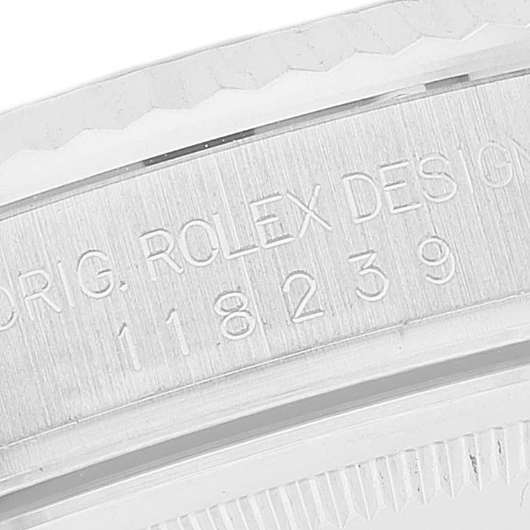 The image shows a close-up of the engraved side of a Rolex President 118239 Men's White Gold Blue Dial 118239 Men's White Gold Blue Dial watch model 118239.
