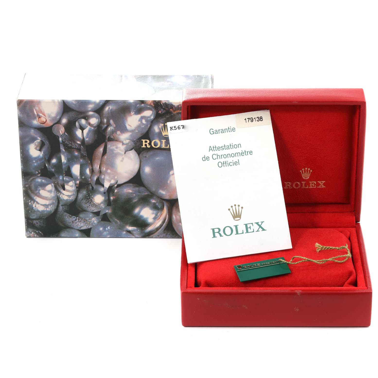 The image shows the packaging and certification documents for a Rolex President 179138G Women's Yellow Gold Champagne Dial 179138G Women's Yellow Gold Champagne Dial model watch.