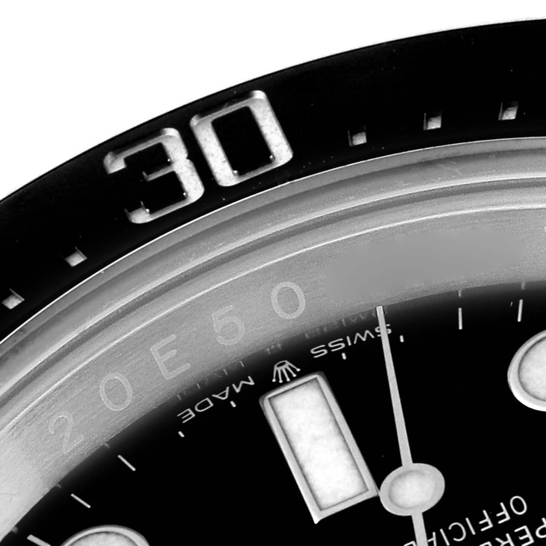 This is a close-up angle of the dial and bezel of the Rolex Sea-Dweller 126600 Men
s Stainless Steel Black Dial 126600 Men
s Stainless Steel Black Dial watch.