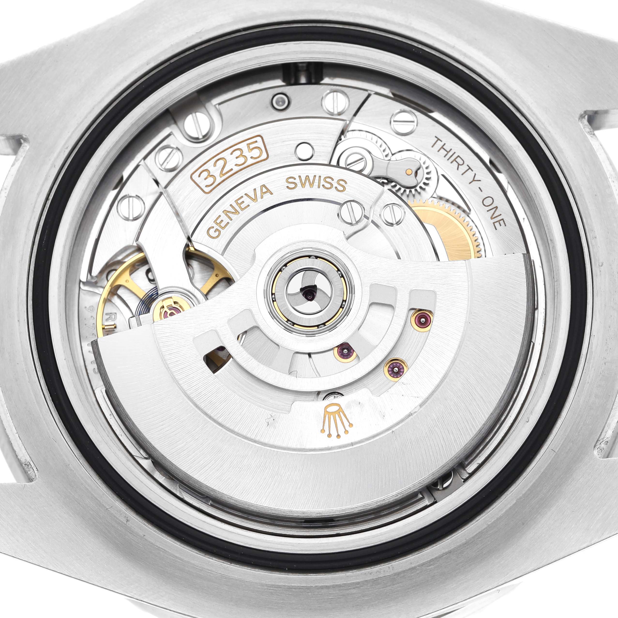 This image shows a close-up view of the movement inside a Rolex Sea-Dweller 126600 Men
s Stainless Steel Black Dial 126600 Men
s Stainless Steel Black Dial watch, highlighting the intricate mechanical parts.