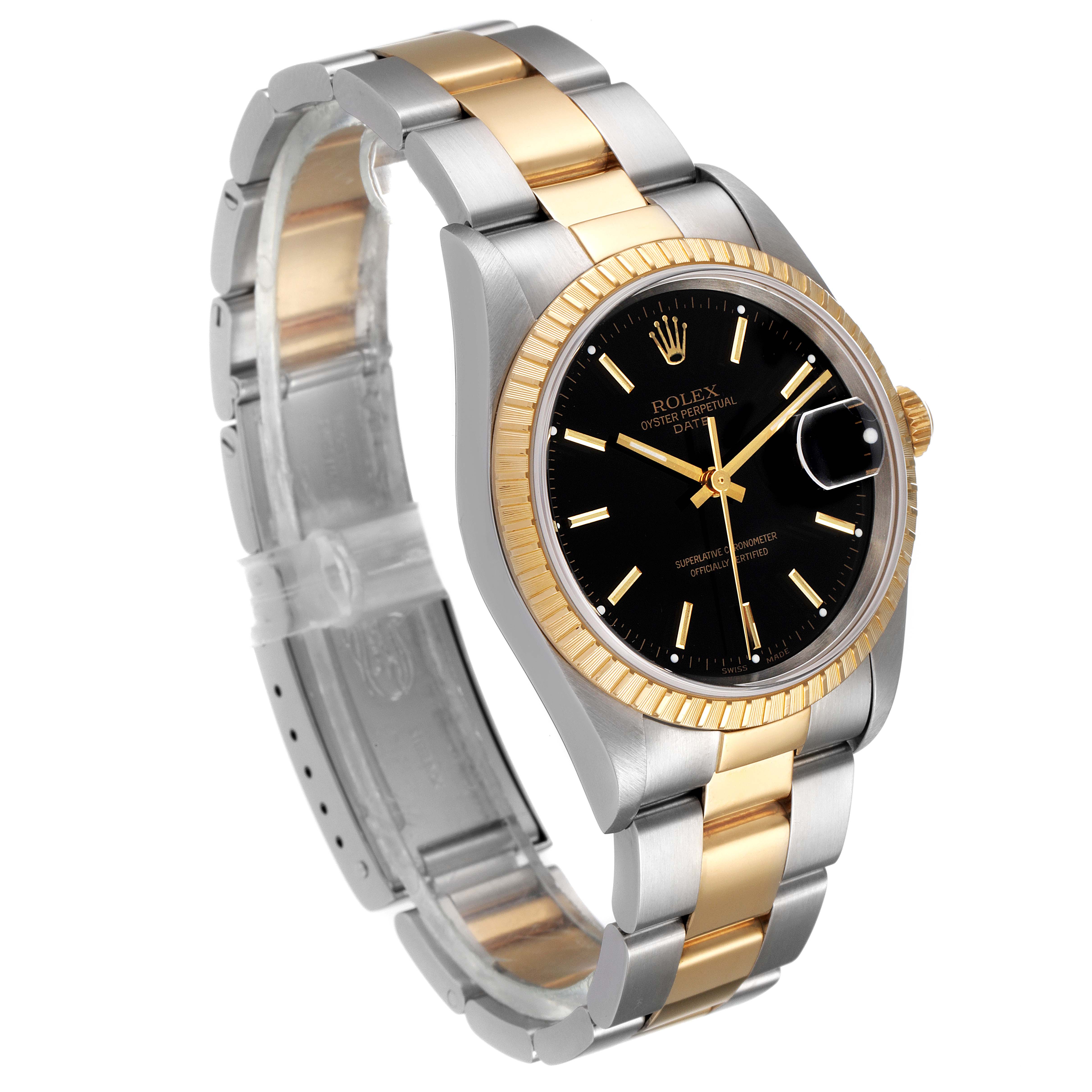The image shows a side angle of a Rolex Date 15223 Men's Steel and Gold (two tone) Black Dial 15223 Men's Steel and Gold (two tone) Black Dial watch, highlighting its black dial, two-tone bracelet, fluted bezel, and date magnifier.