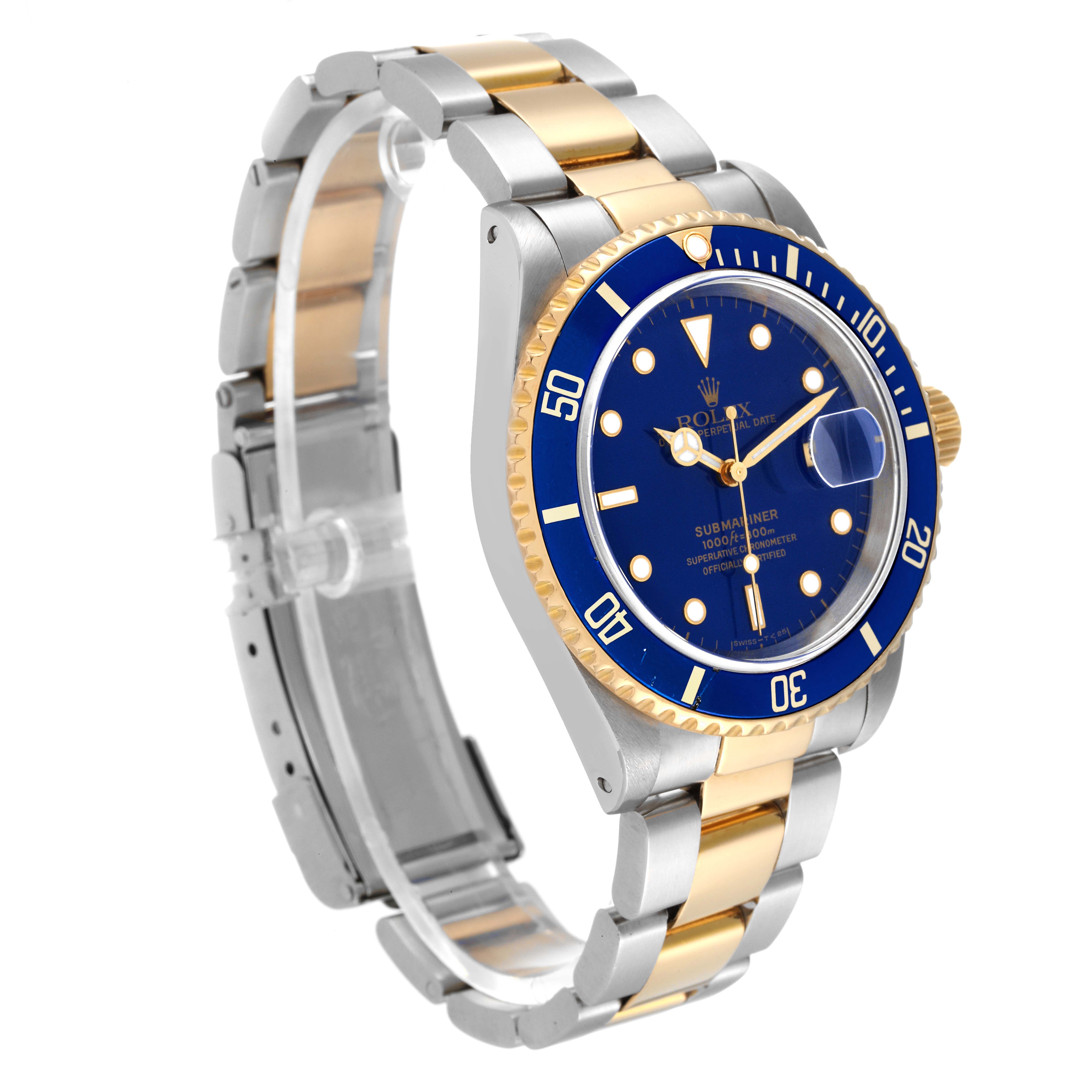 The image shows a Rolex Submariner 16613 Men's Steel and Gold (two tone) Blue Dial 16613 Men's Steel and Gold (two tone) Blue Dial watch at a three-quarter angle, displaying its face, bezel, and bracelet.