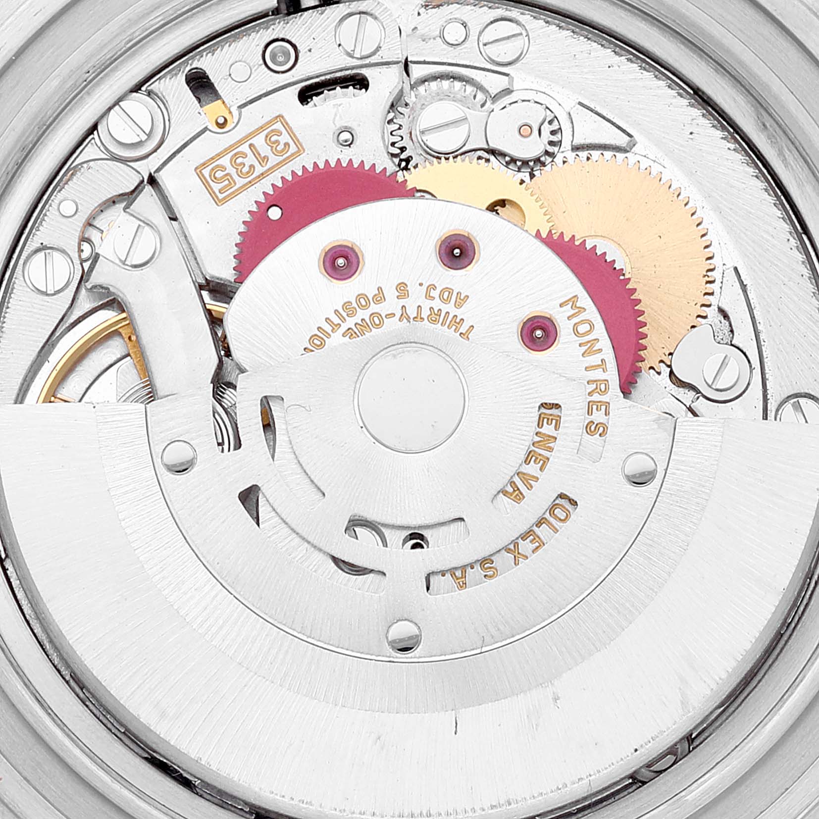 This image shows a close-up of the movement mechanism inside a Rolex Submariner 16613 Men's Steel and Gold (two tone) Blue Dial 16613 Men's Steel and Gold (two tone) Blue Dial watch, highlighting gears and intricate components.