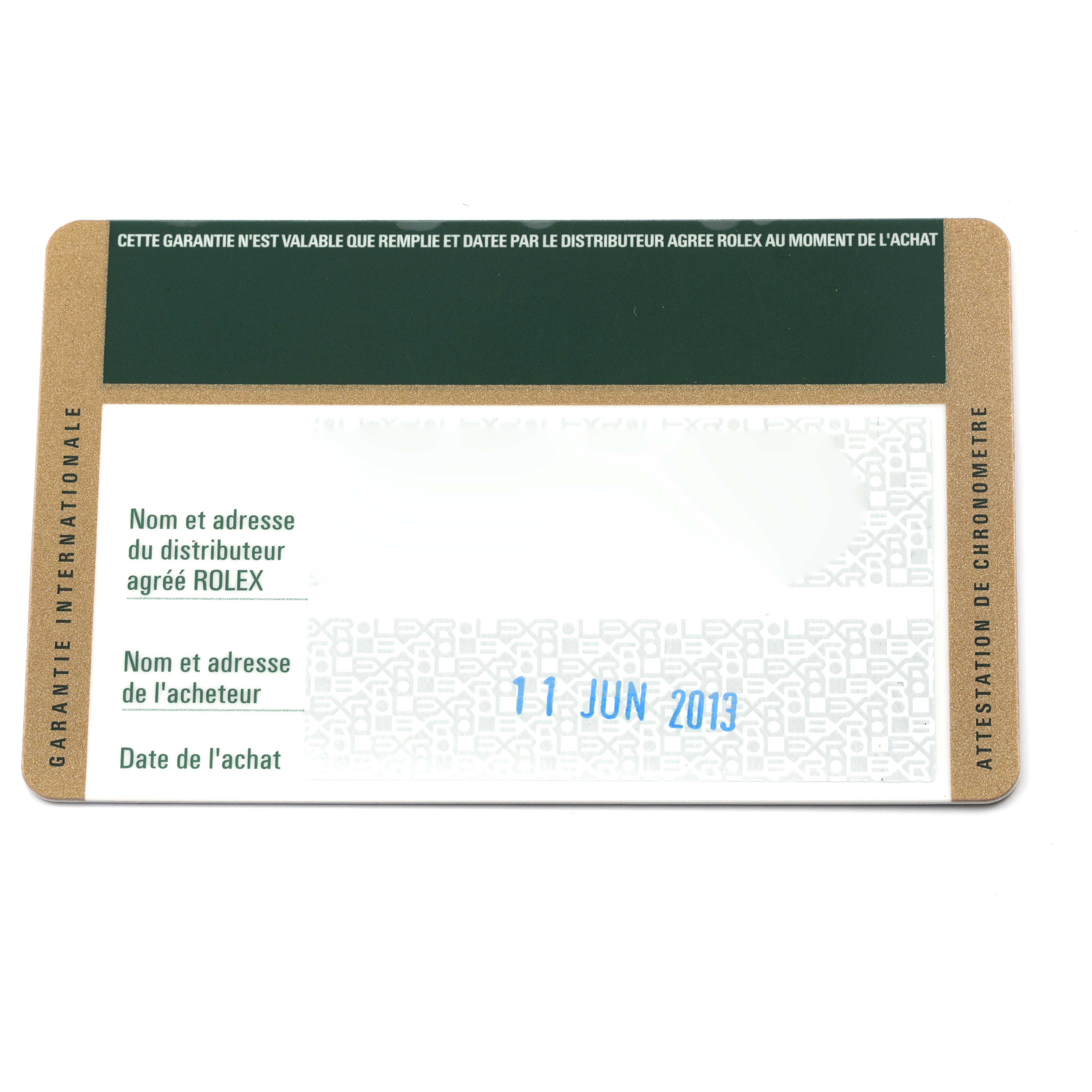 This image shows a warranty card for a Rolex Submariner 116610LV Men's Stainless Steel Green Dial 116610LV Men's Stainless Steel Green Dial, featuring printed text and a date.