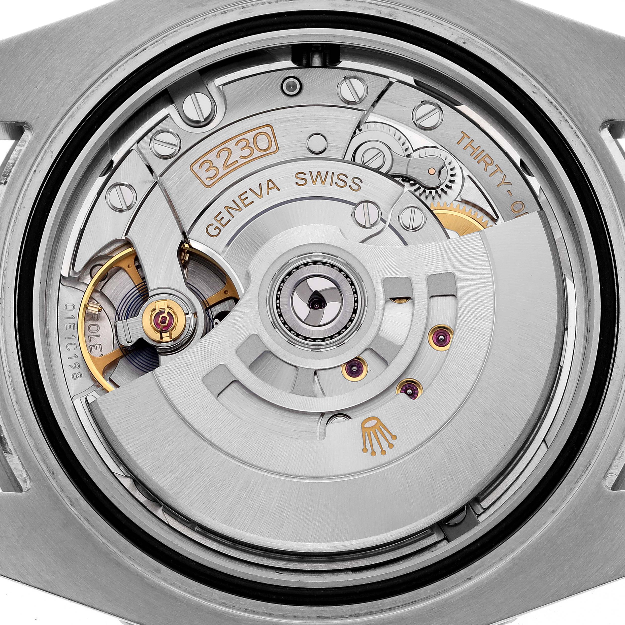 The image shows the Rolex Submariner 124060 Men's Stainless Steel Black Dial 124060 Men's Stainless Steel Black Dial's movement from the back, highlighting its mechanical components and details.