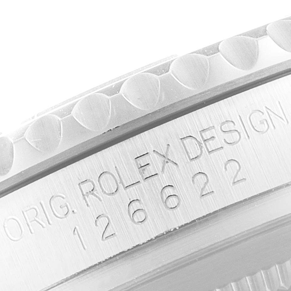 Close-up of the side of a Rolex Yacht-Master 126622 Men's Stainless Steel Blue Dial 126622 Men's Stainless Steel Blue Dial watch, showing engraved model number "126622" and the word "Design."