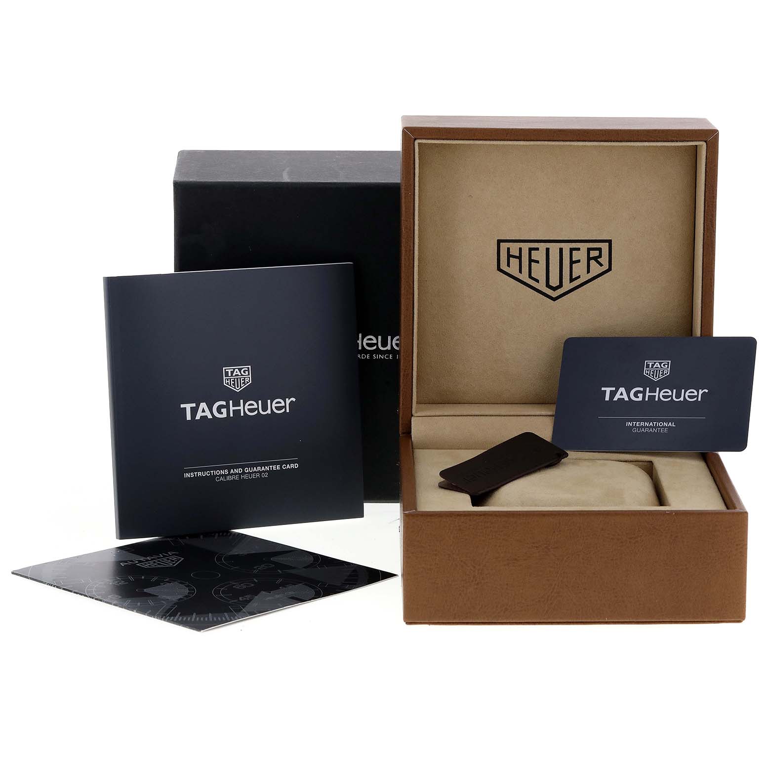 This image shows the packaging, manual, international guarantee card, and box for the Tag Heuer Autavia CBE2110.FC8226 Men
s Stainless Steel Black Dial CBE2110.FC8226 Men
s Stainless Steel Black Dial watch.