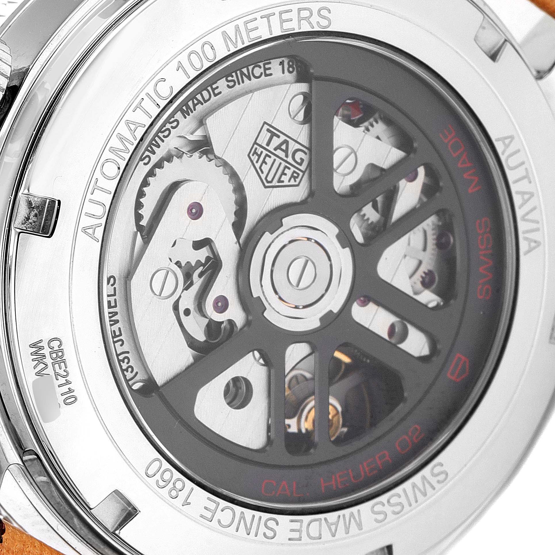 The image shows the back of a Tag Heuer Autavia CBE2110.FC8226 Men
s Stainless Steel Black Dial CBE2110.FC8226 Men
s Stainless Steel Black Dial watch, revealing the automatic movement mechanism and branding details.