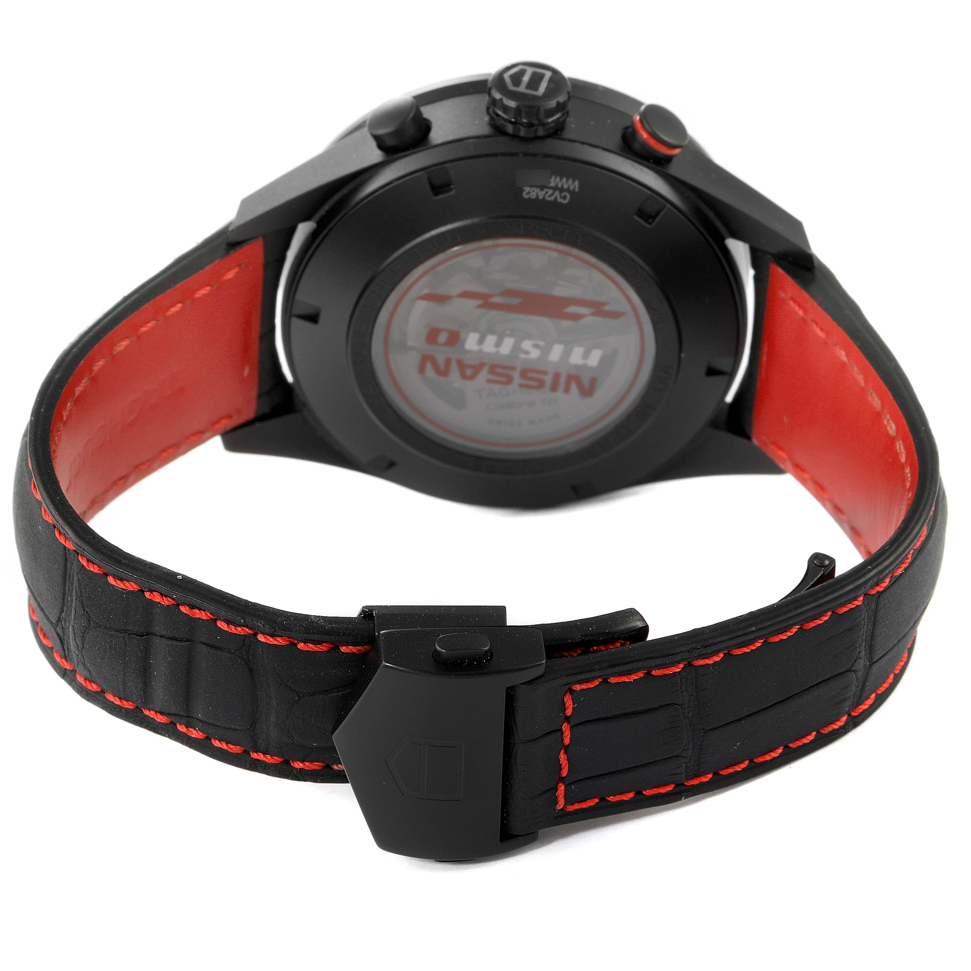 The image shows the rear view of a Tag Heuer Carrera CV2A82.FC6237 Men's Titanium Black Dial CV2A82.FC6237 Men's Titanium Black Dial watch, highlighting the back case and black leather strap with red stitching.