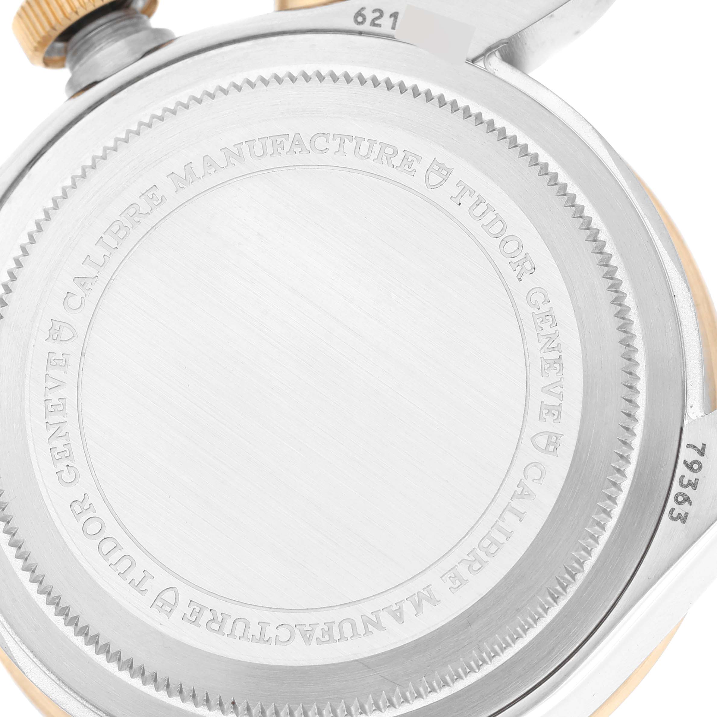 The image shows a close-up view of the back case of a Tudor Heritage Black Bay 79363N Men
s Steel and Gold (two tone) Black Dial 79363N Men
s Steel and Gold (two tone) Black Dial watch.